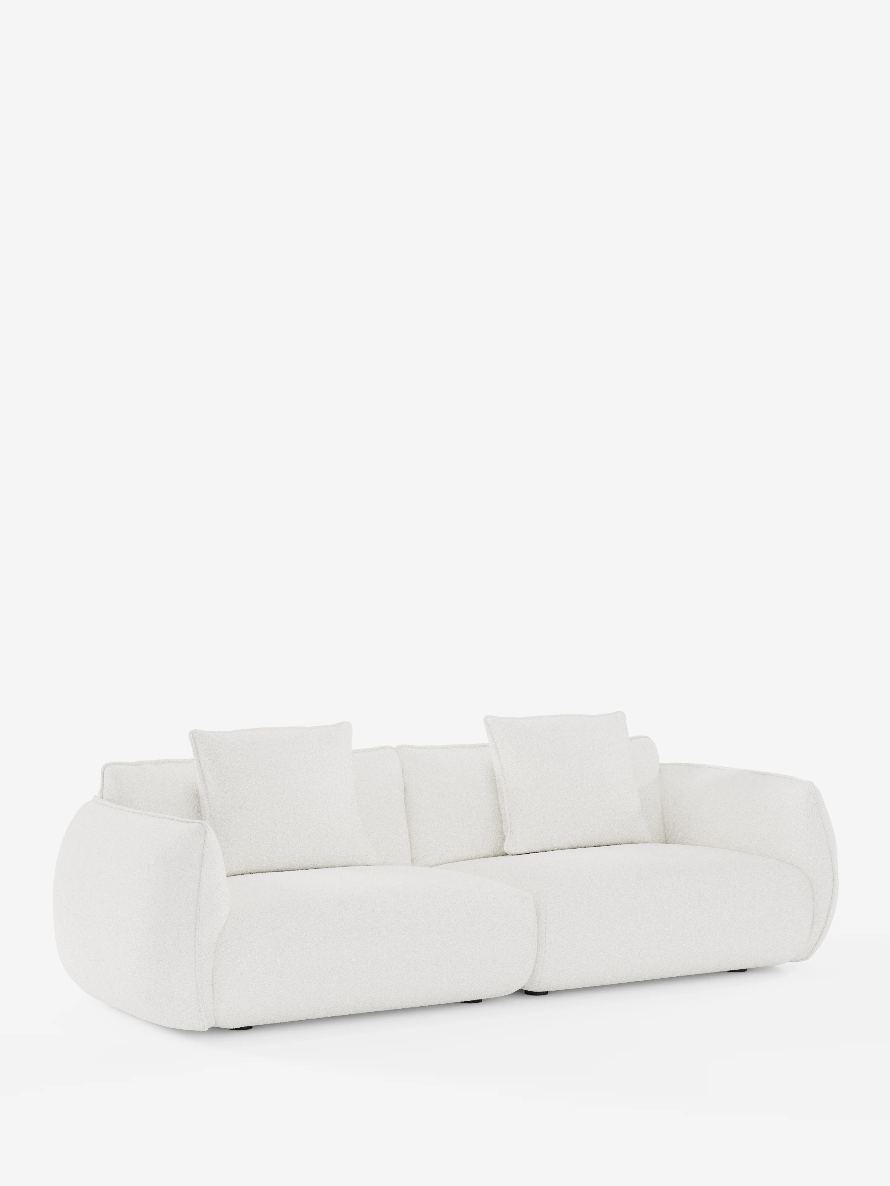 Il divano modulare a 3 posti Nimbus di Divani.Store presenta un design moderno in bianco, con bordi arrotondati e morbidi e una silhouette dal profilo basso. Con una lunghezza di 250 cm, questo divano comprende due cuscini di seduta e quattro cuscini schienali quadrati abbinati, tutti rivestiti in tessuto sfoderabile con effetto cotone testurizzato e resistente alle macchie (t33). Presentato su uno sfondo bianco a tinta unita, ne viene esaltata l’estetica minimalista e contemporanea.