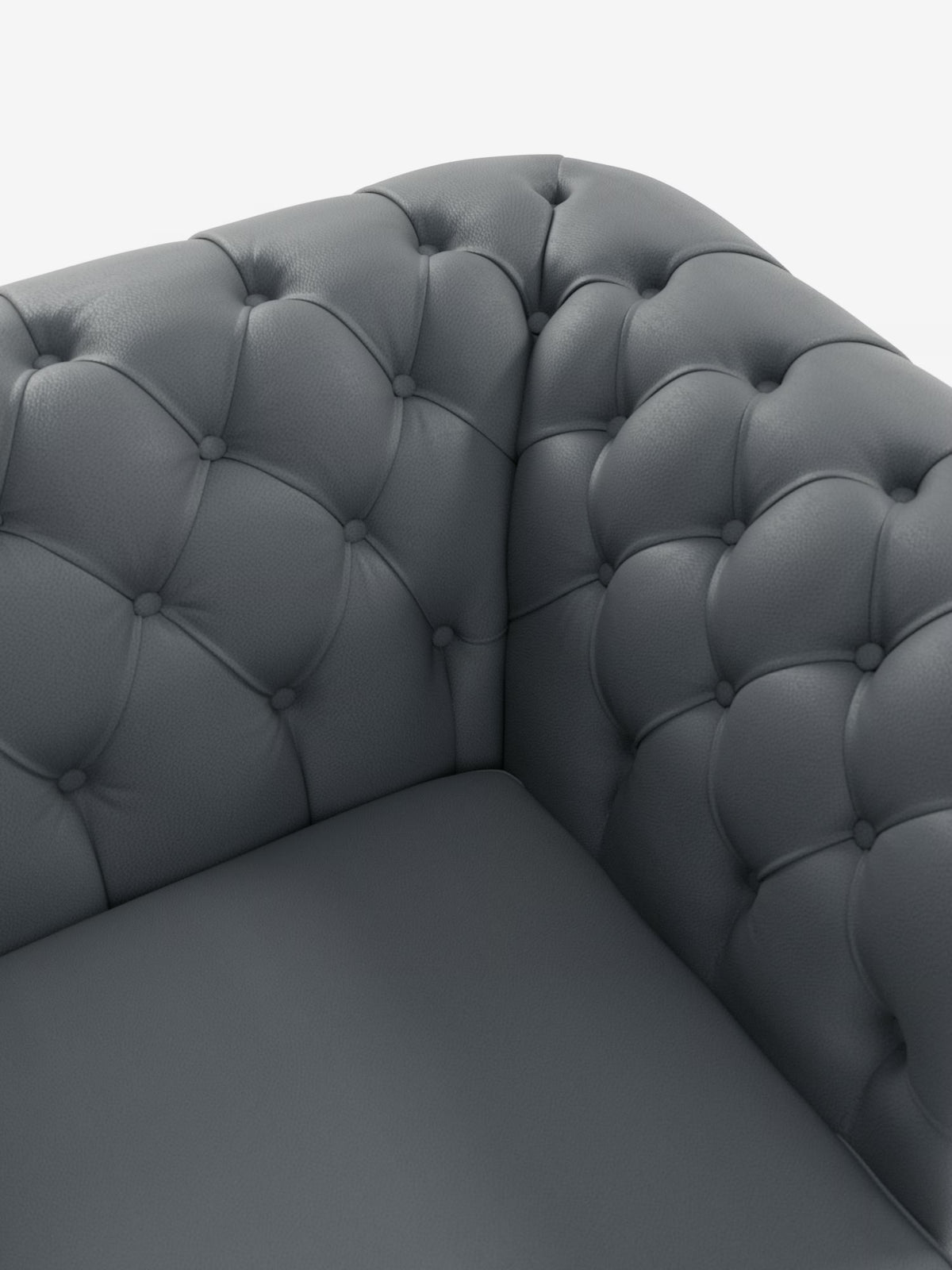 Primo piano di una poltrona in pelle grigio scuro trapuntata con dettagli a bottoni. Realizzata con maestria da Divani.Store, la Chester 4 Posti 3 sedute in Vera Pelle – Chesterfield Capitonné Artigianale presenta schienale e braccioli curvi, che mettono in risalto la texture lussuosa e le cuciture precise del rivestimento in vera pelle su uno sfondo bianco a tinta unita.