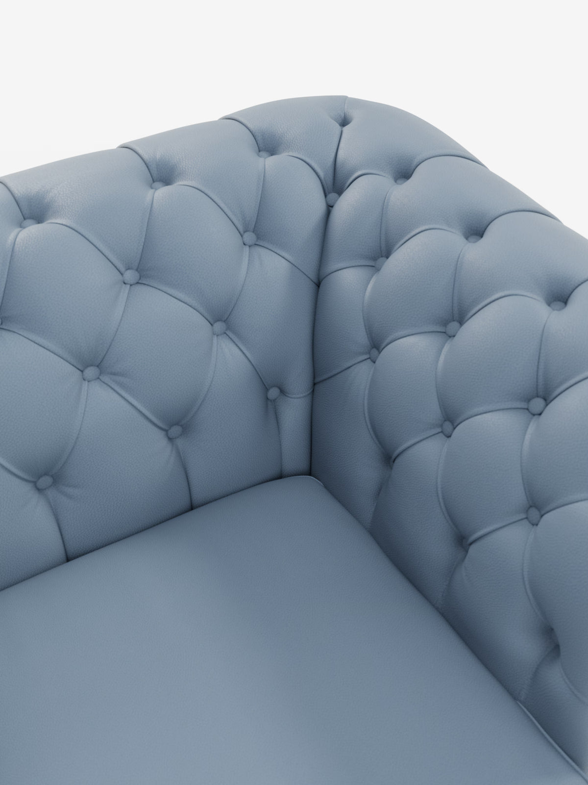 Primo piano di un divano ad angolo in pelle blu trapuntata, con motivo a rombi profondamente bottonato sullo schienale e sui braccioli, che mette in risalto la seduta morbida e imbottita e la texture soffice. Il Chester 4 Posti 3 sedute in Vera Pelle – Chesterfield Capitonné Artigianale di Divani.Store è realizzato in vera pelle; lo sfondo bianco a tinta unita mette in risalto gli squisiti dettagli del rivestimento Made in Italy.