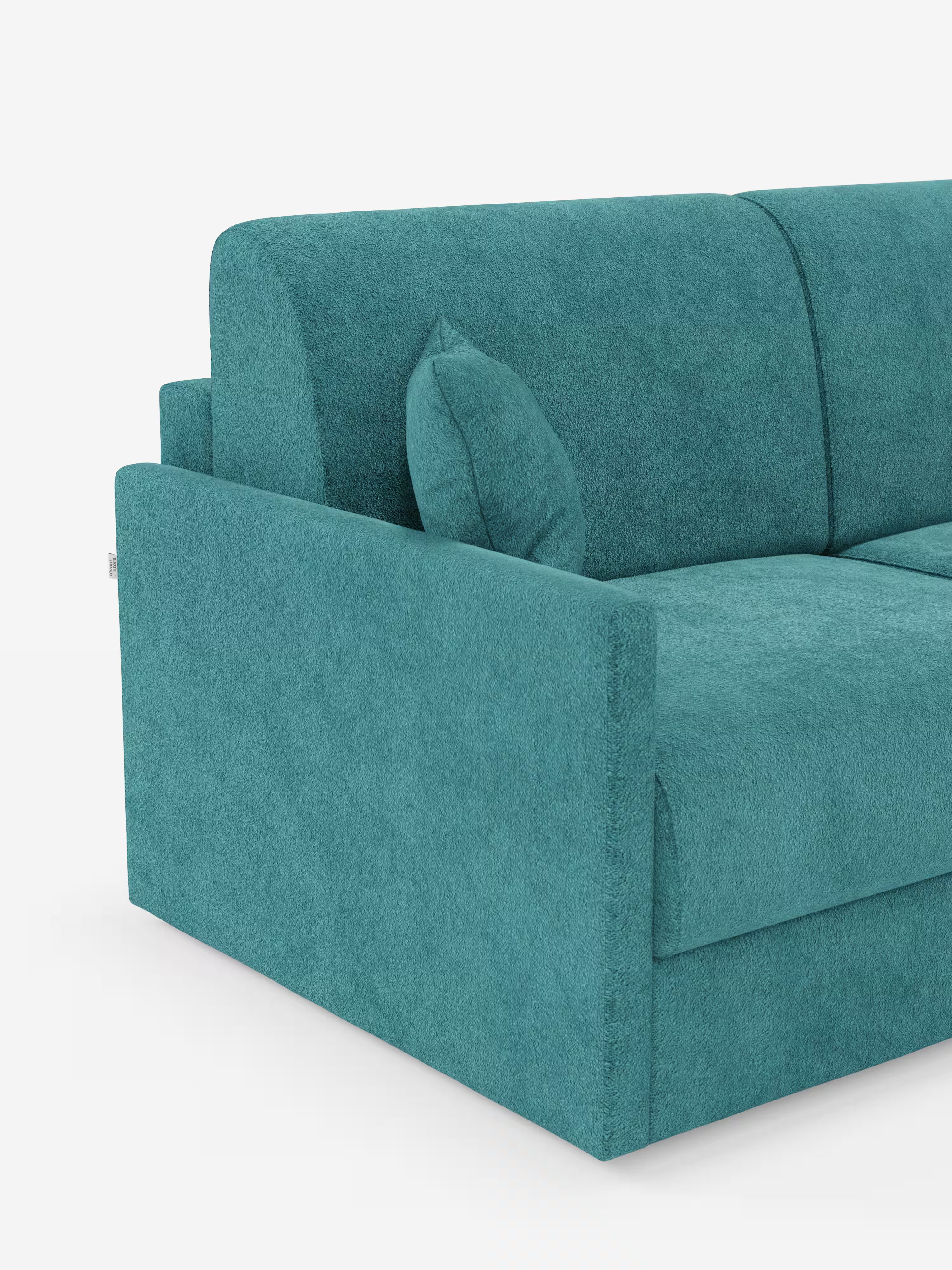 Un divano letto Tommy Divano a 2 e 3 posti matrimoniale color verde acqua di Divani.Store, rivestito in tessuto T33 morbido, resistente alle macchie e simile al cotone. Questo moderno divano letto presenta linee pulite, braccioli squadrati e include un cuscino coordinato appoggiato allo schienale. Il rivestimento completamente sfoderabile garantisce una facile pulizia; il divano è raffigurato su uno sfondo bianco senza gambe visibili.