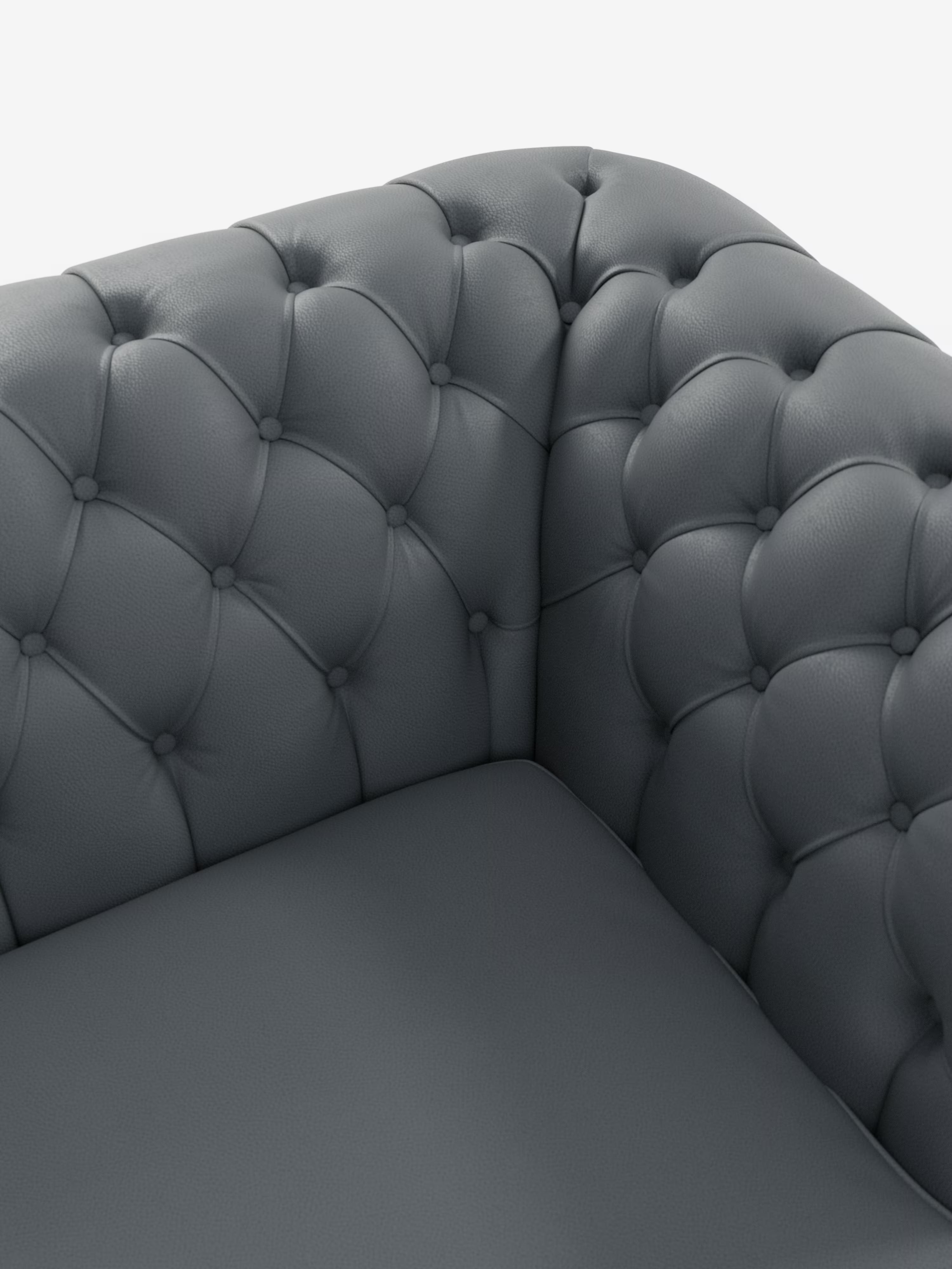 Primo piano del divano Chester – Divano Chesterfield di Divani.Store, realizzato in pelle vera di grosso spessore, che mette in risalto i dettagli trapuntati con bottoni e la texture lussuosa del rivestimento della seduta e dello schienale.