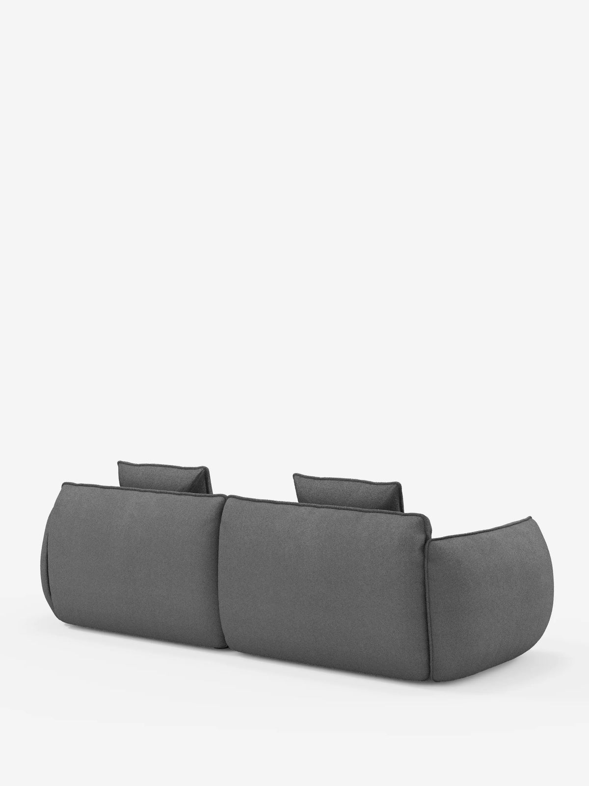 Il divano Nimbus, un modello moderno e dal profilo basso, a 3 posti, modulare e componibile da 250 cm di Divani.Store, è raffigurato di retro. Rivestito in tessuto grigio smacchiabile effetto cotone T33, presenta due ampie sezioni di seduta e due cuscini rettangolari per lo schienale. Il design minimalista mette in risalto i bordi arrotondati e i fianchi morbidi e imbottiti, il tutto su uno sfondo bianco a tinta unita.