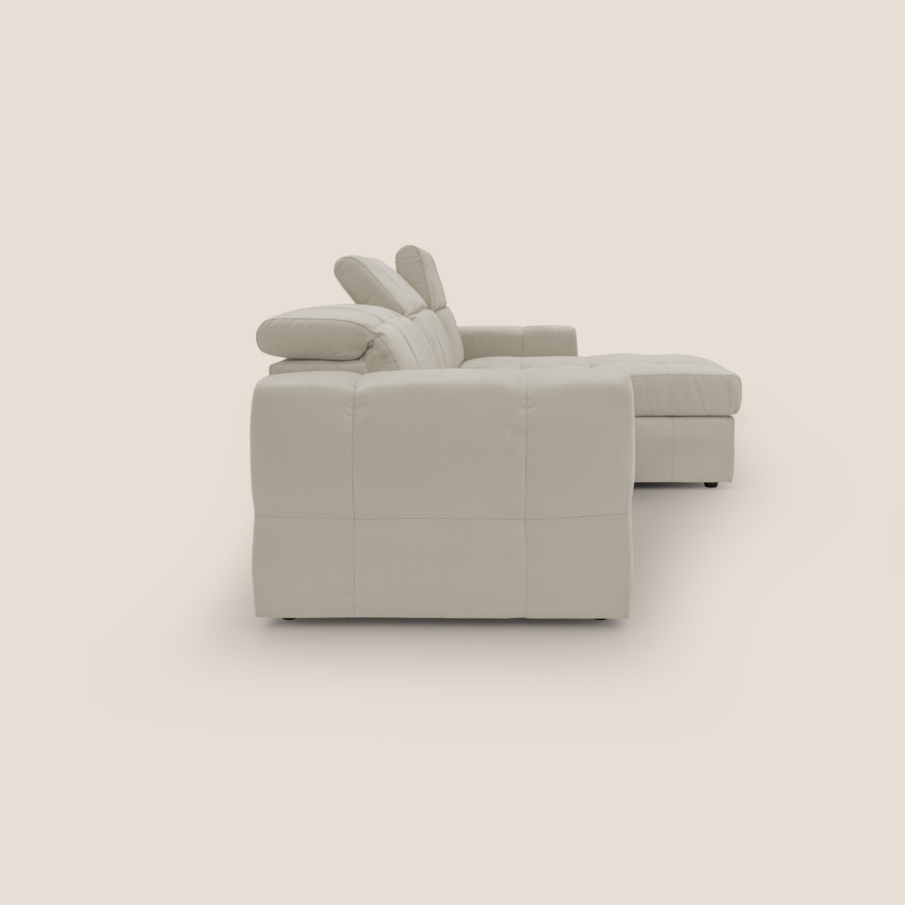 Kronos Divano angolare con pouf estraibile e penisola contenitore in microfibra impermeabile T11 panna - divani.store