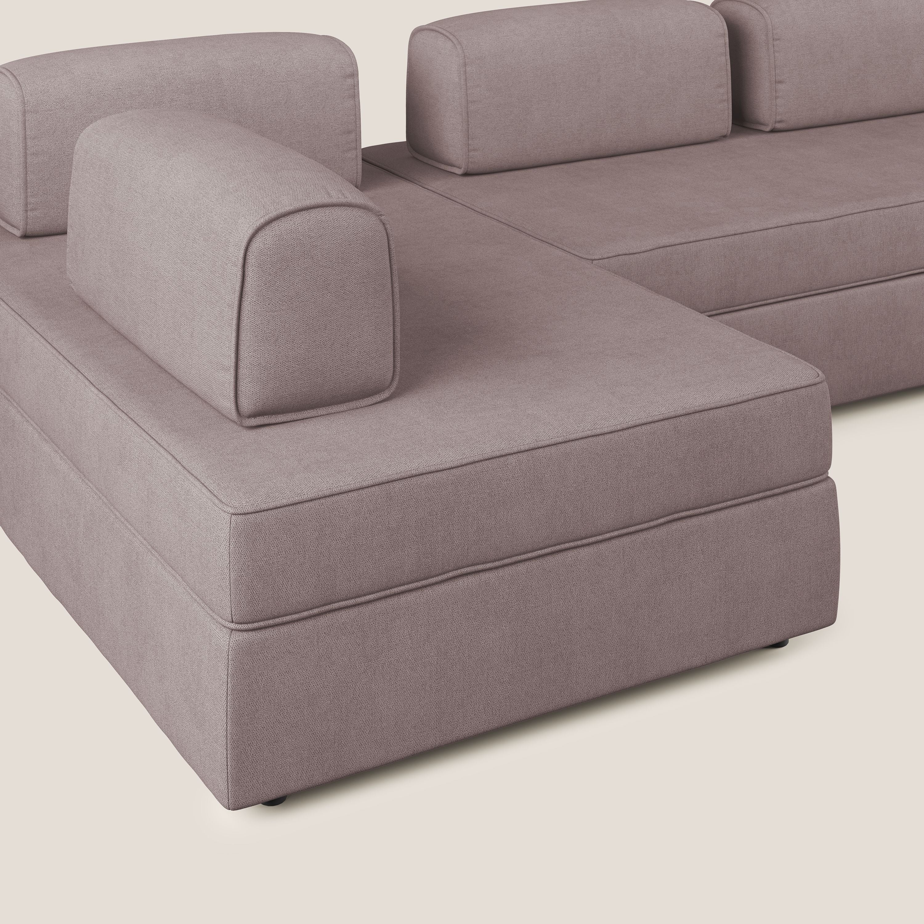 Liberty divano panoramico con pouf estraibile e schienali movibili in tessuto morbido impermeabile T02 rosa - divani.store