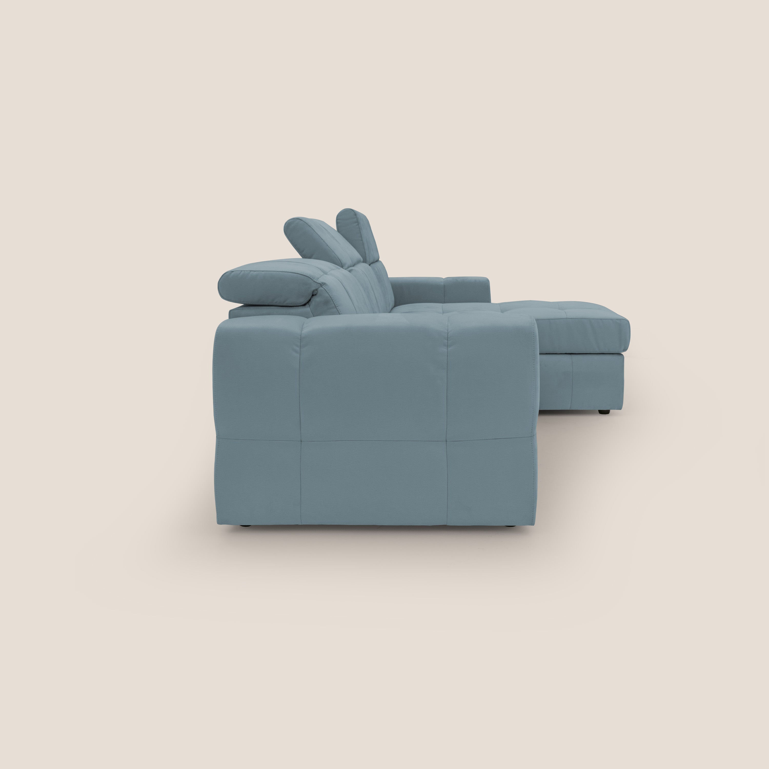 Kronos Divano angolare con pouf estraibile e penisola contenitore in microfibra impermeabile T11 carta da zucchero - divani.store