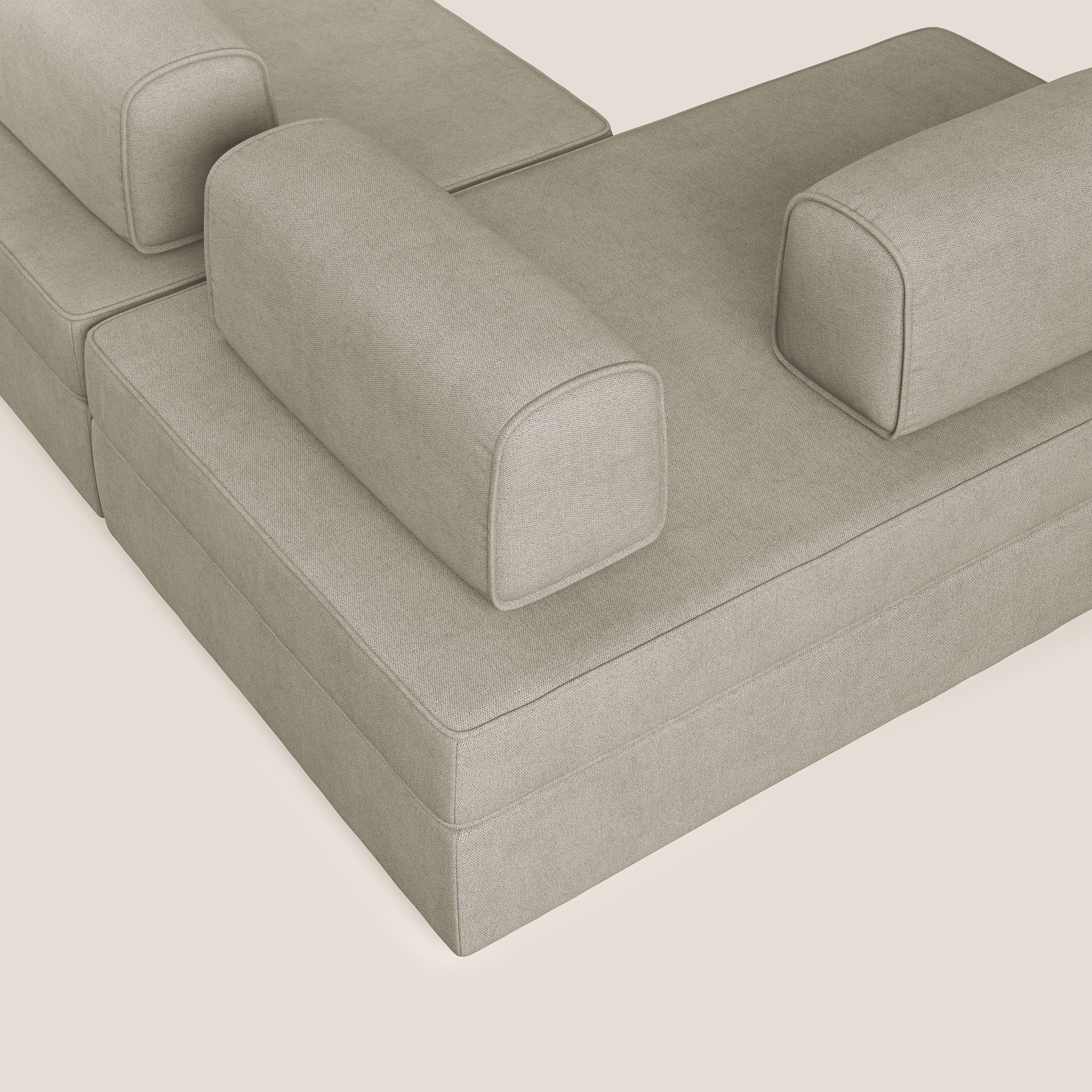 Liberty divano panoramico con pouf estraibile e schienali movibili in tessuto morbido impermeabile T02 panna - divani.store