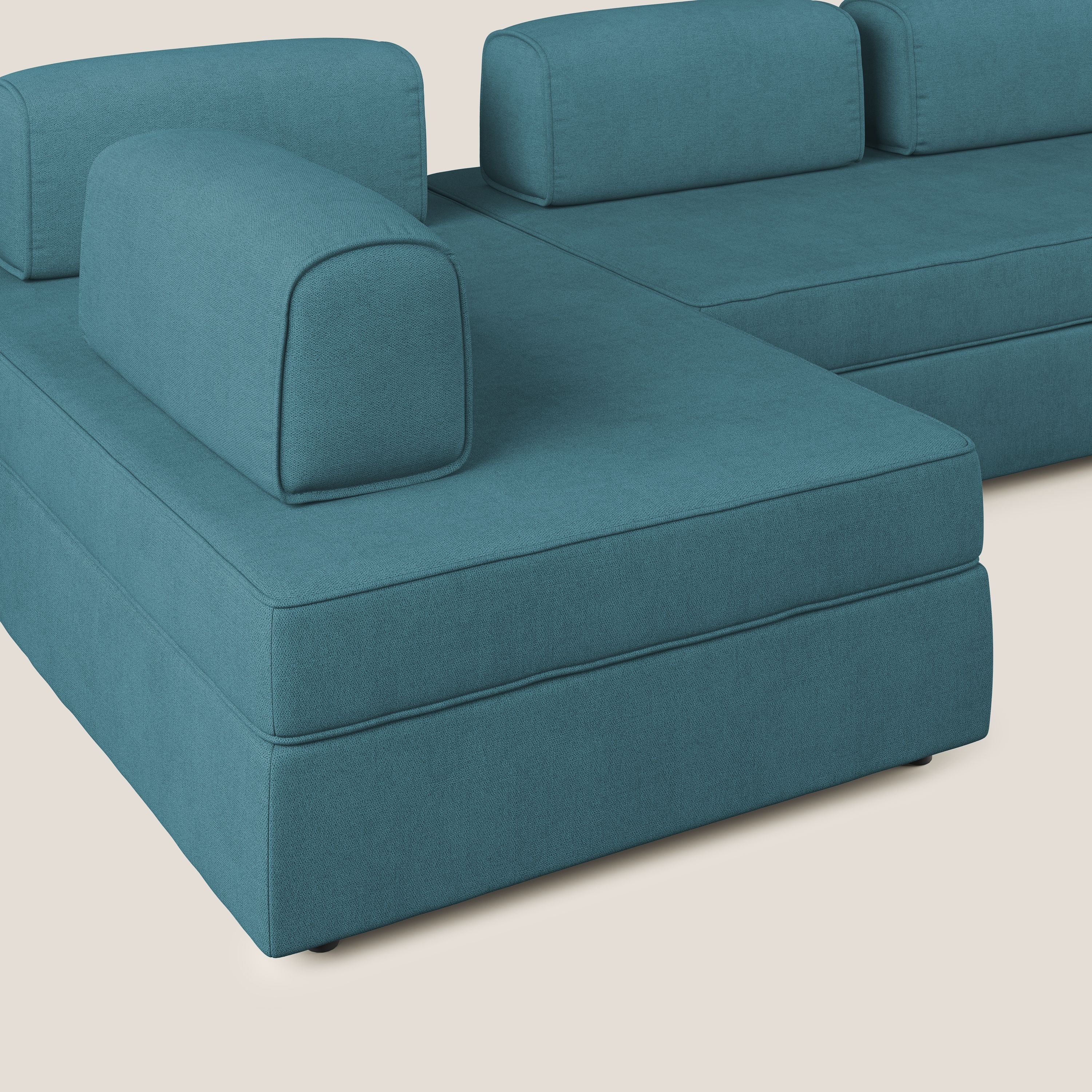 Liberty divano panoramico con pouf estraibile e schienali movibili in tessuto morbido impermeabile T02 azzurro - divani.store