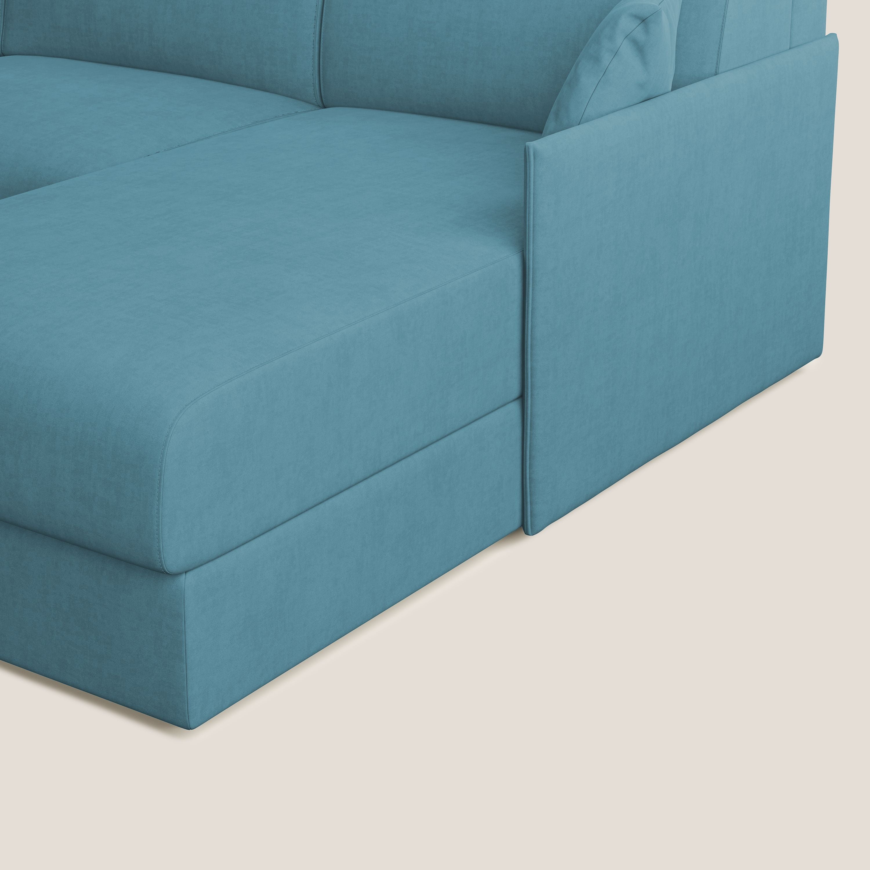 Evans Divano letto angolare con penisola in morbido tessuto impermeabile T02 azzurro - divani.store
