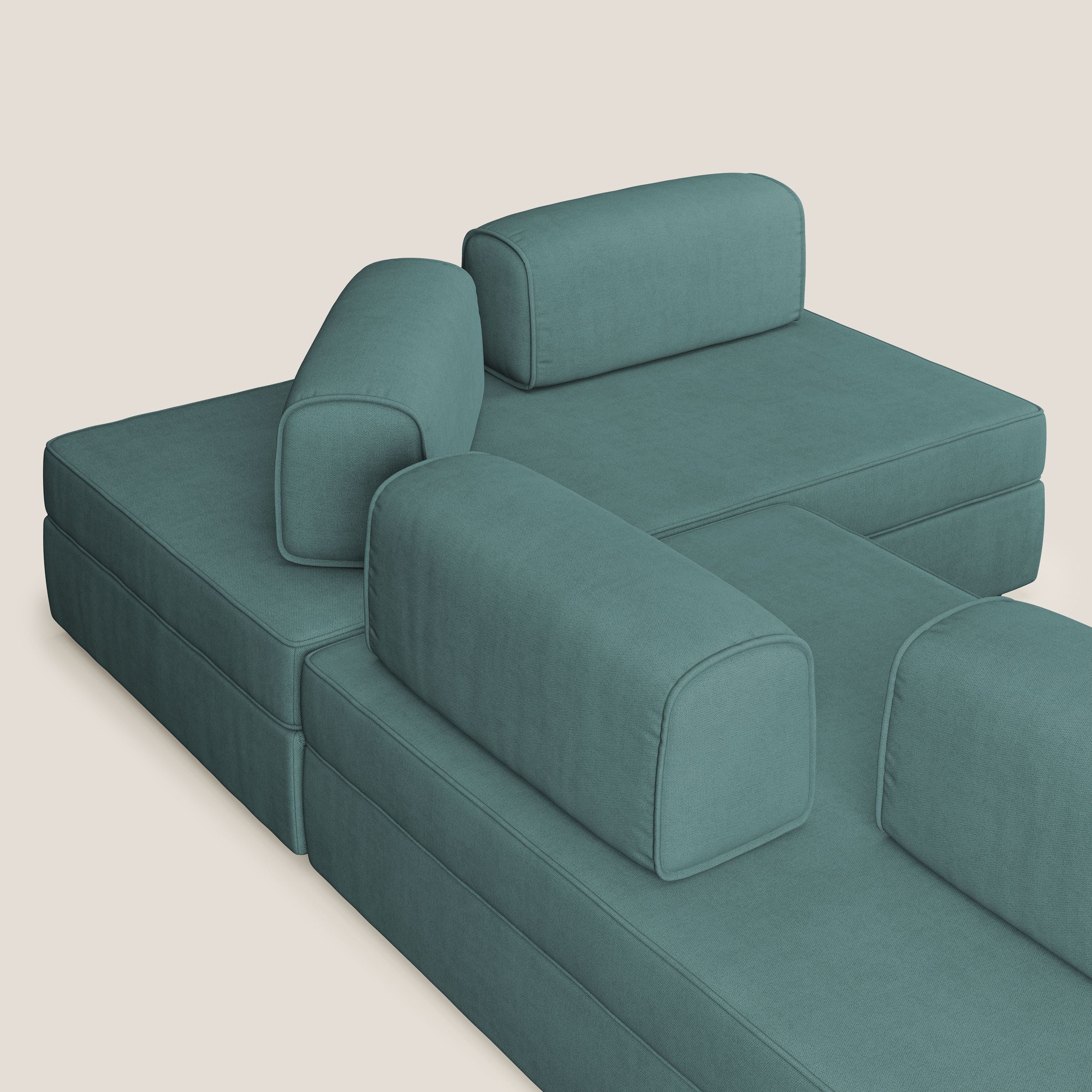 Liberty divano angolare con pouf estraibile e schienali movibili in tessuto morbido impermeabile T02 petrolio - divani.store