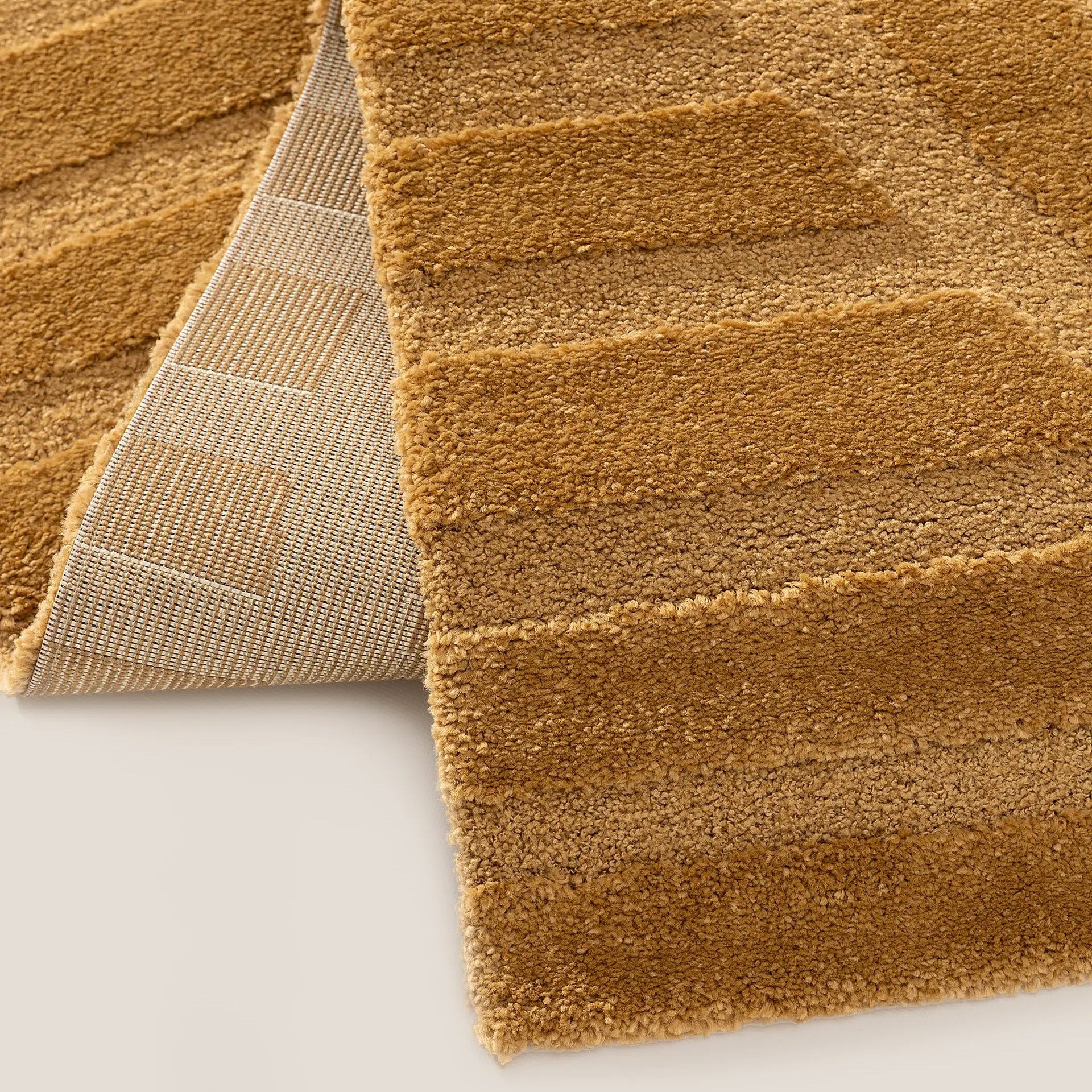 Zefira tappeto con motivo a rilievo giallo impermeabile - divani.store