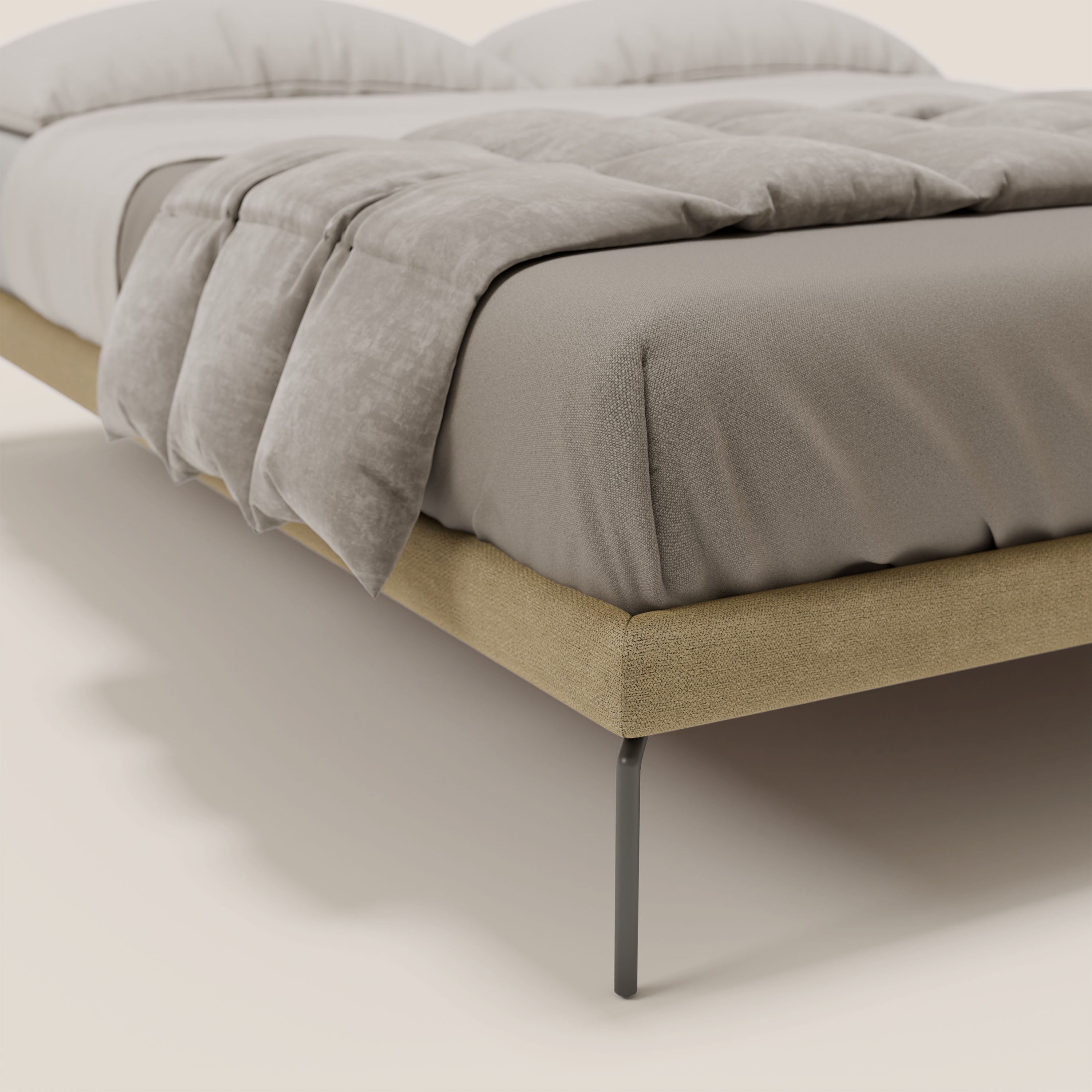 Un primo piano del sommier sfoderabile Ring di Letti.store, con gambe nere alte 24 cm e tessuto impermeabile beige T14, mette in mostra il design e la qualità italiana in uno scenario minimalista.