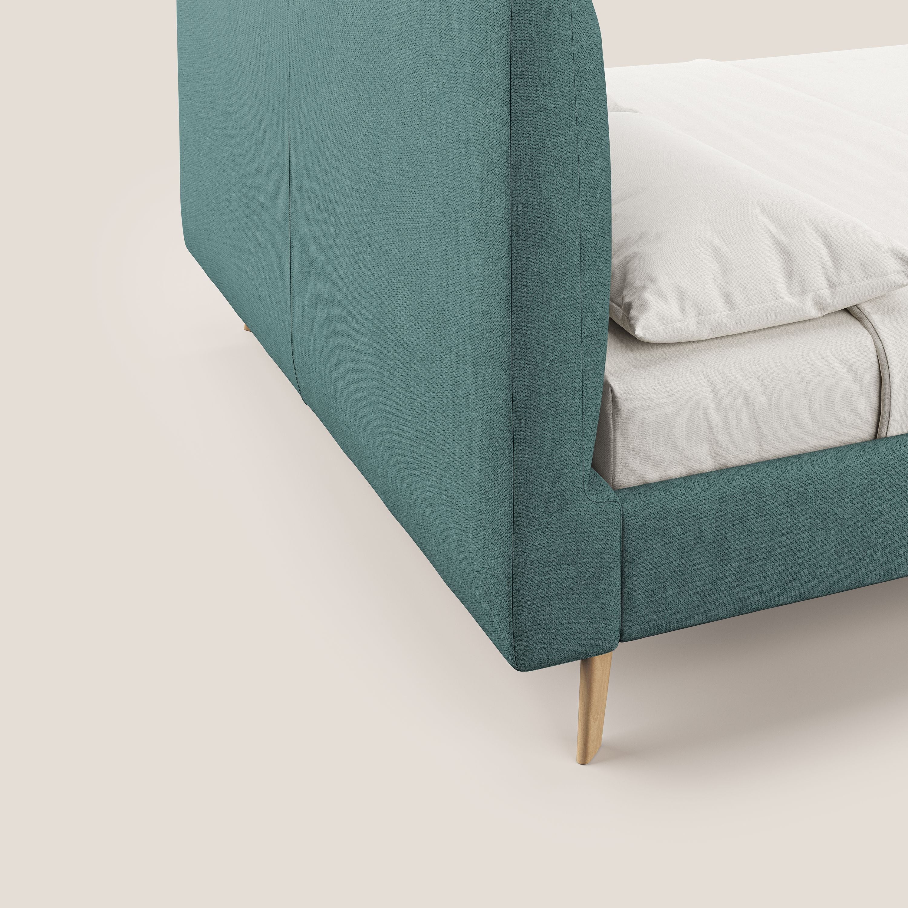 Selene letto imbottito con piedini naturali sfoderabile in tessuto impermeabile T02 petrolio - divani.store