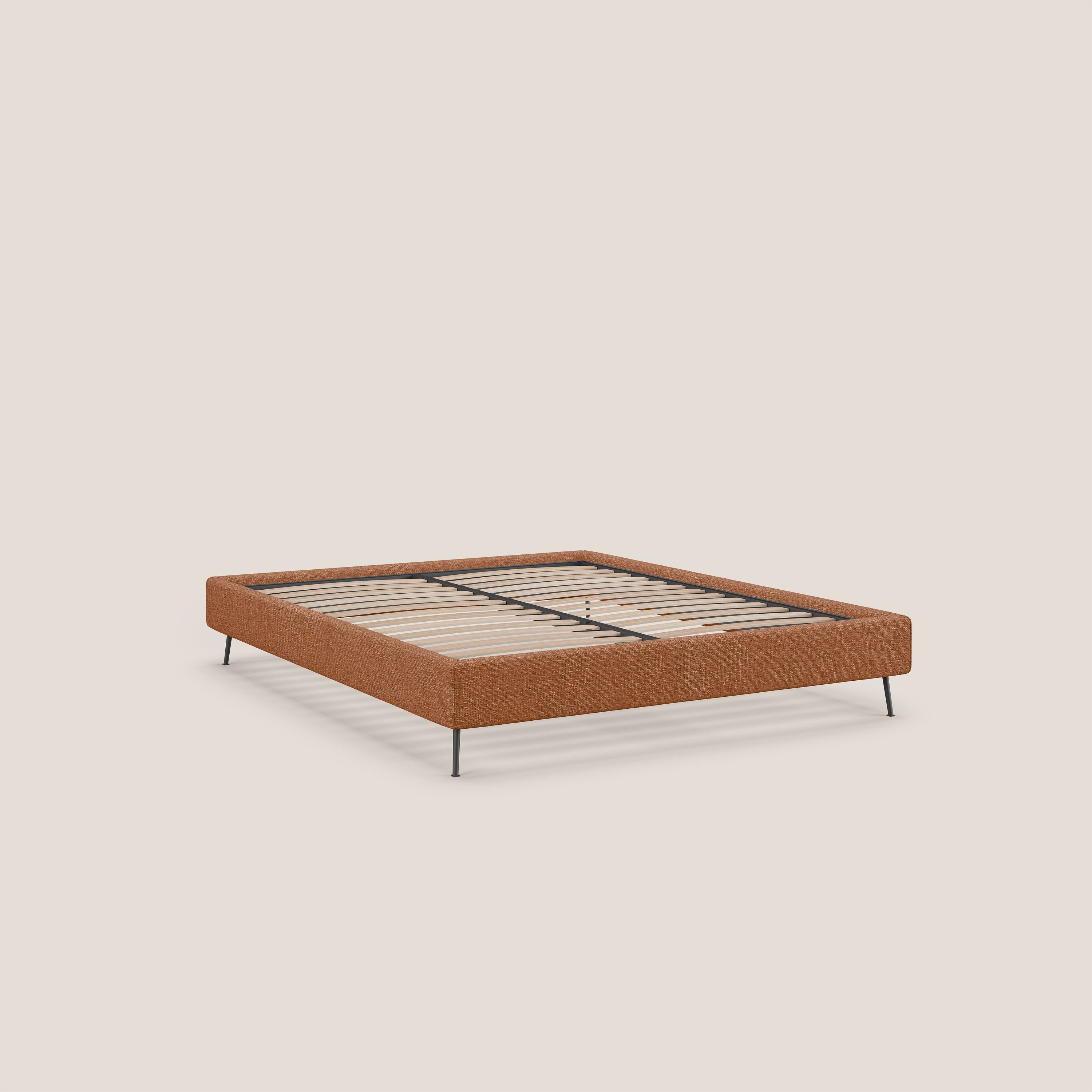 Steve sommier giroletto piedi alti in tessuto impermeabile T10 arancio - divani.store