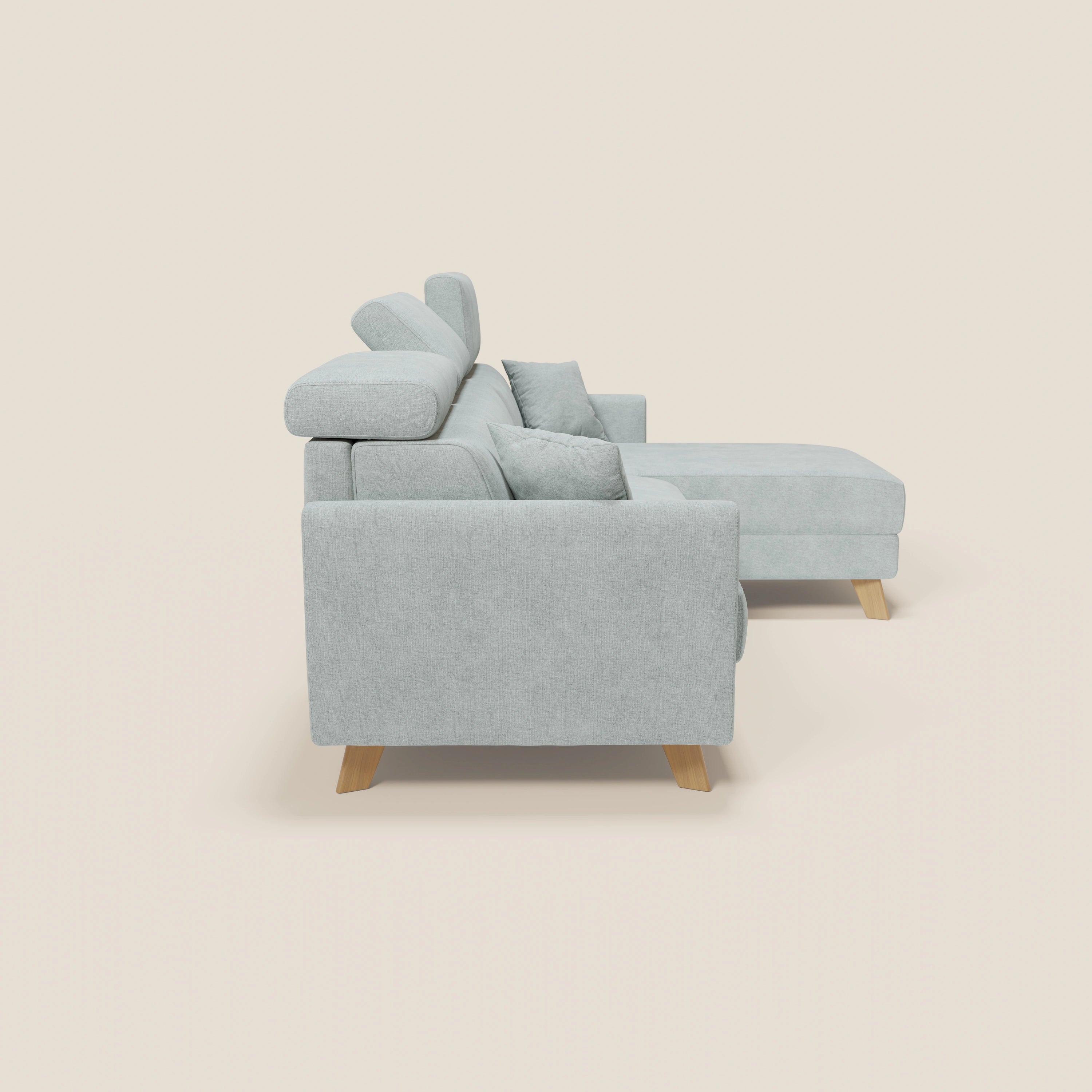 Divani.Store è un moderno divano componibile Francy verde acqua, con tessuto T17 sfoderabile e antimacchia, chaise longue a destra e poggiatesta regolabili, che unisce comfort e versatilità.