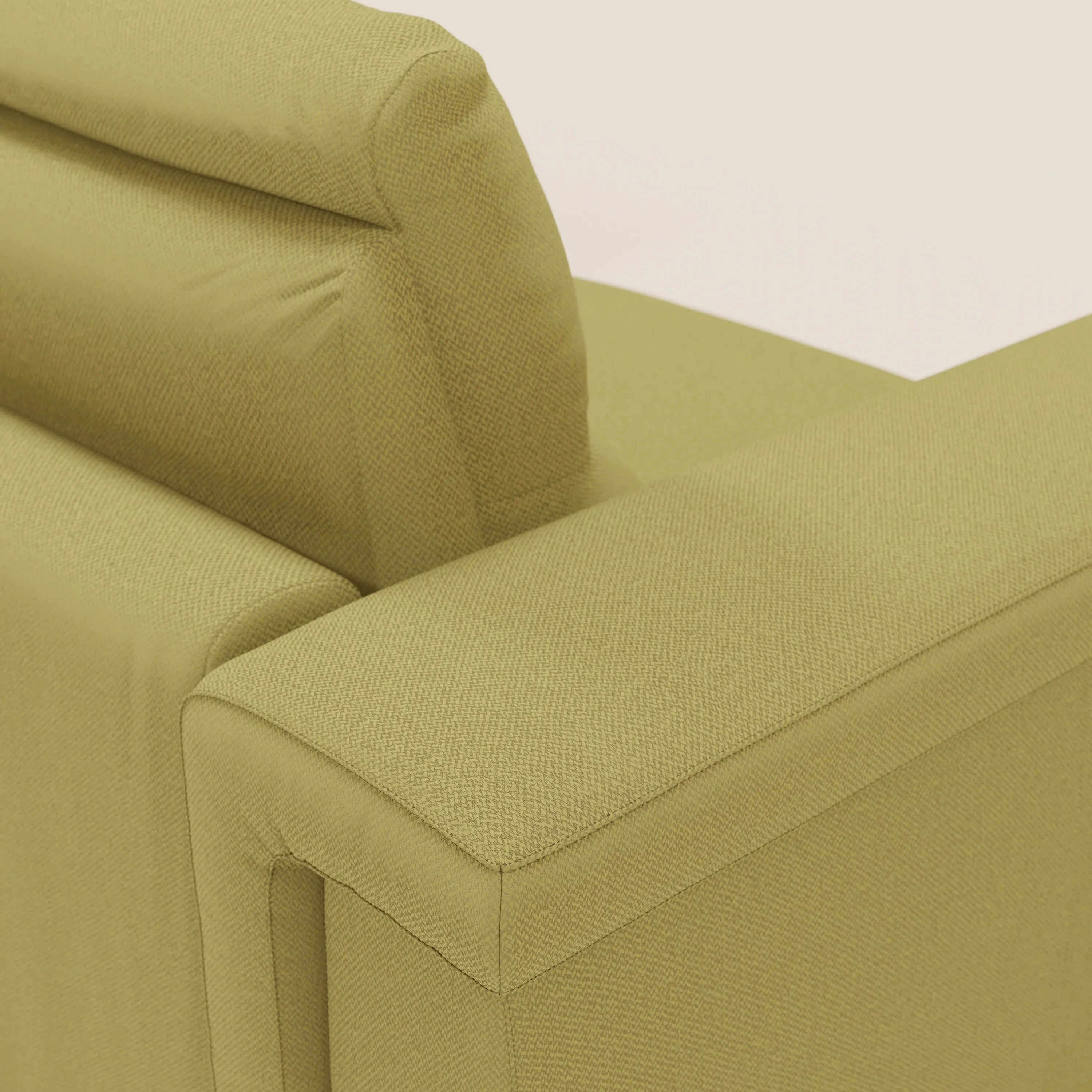 Primo piano del divano letto angolare Magnolia con Penisola Contenitore di Divani.Store in tessuto smacchiabile T05 giallo, che mette in evidenza il bracciolo destro, lo schienale, il poggiatesta e il rivestimento strutturato dalle linee pulite.