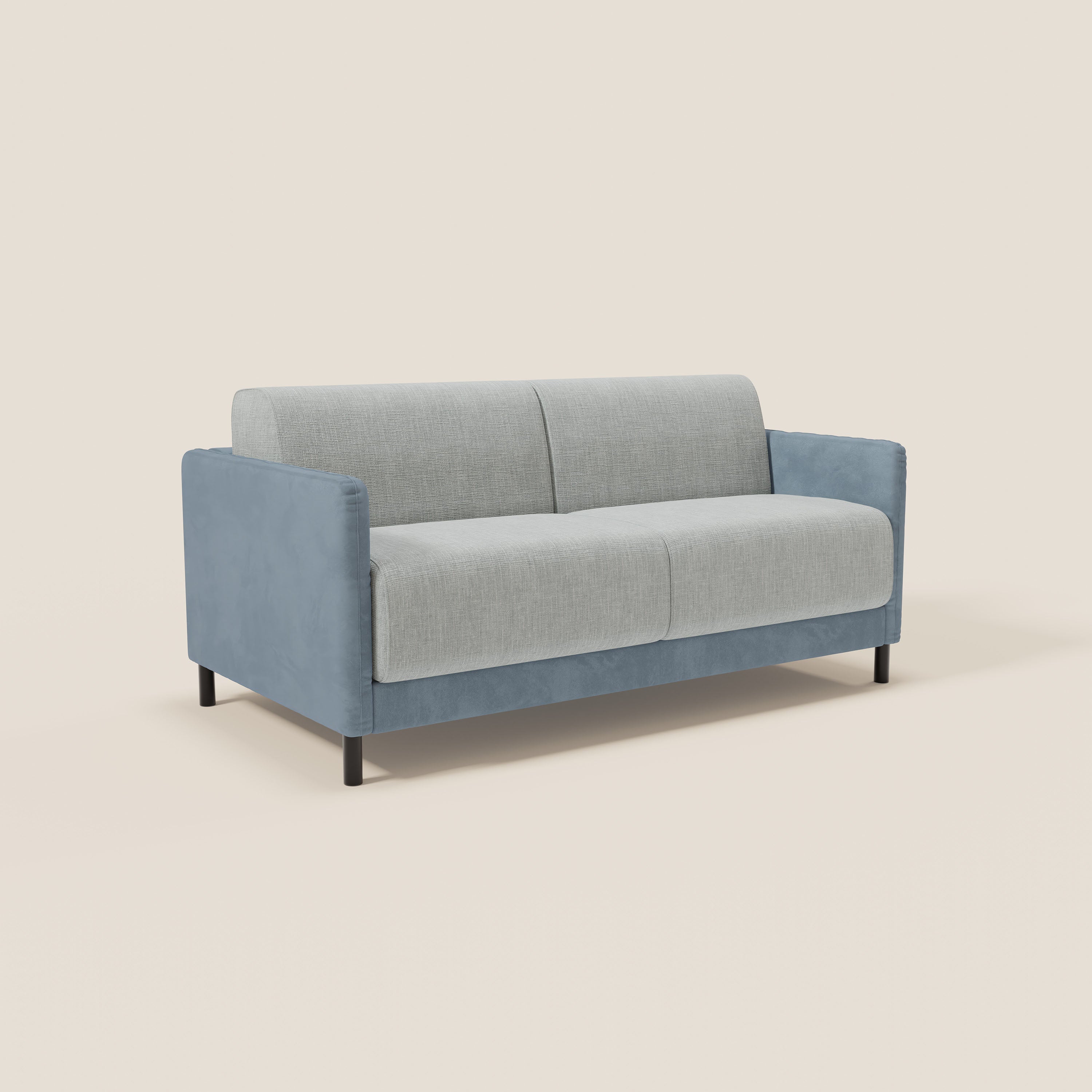 Il divano letto Narciso di Divani.Store è caratterizzato da un design bicolore con struttura in microfibra lavabile e cuscini impermeabili in carta da zucchero-ghiaccio T06, materasso H18 cm e sottili gambe nere, su sfondo beige chiaro.