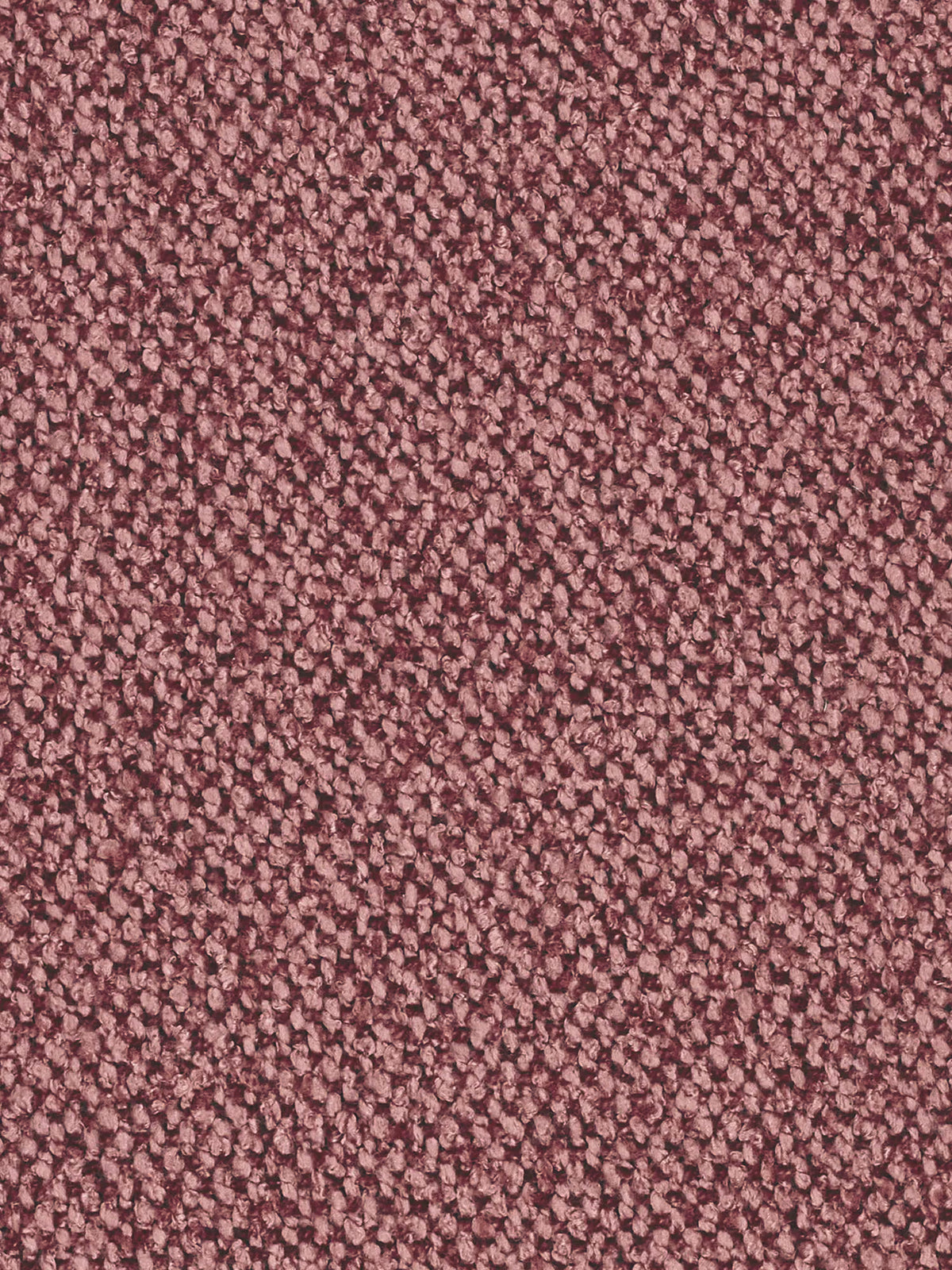 Un primo piano di un tessuto color rosa polveroso dalla trama spessa e irregolare, utilizzato per il divano angolare Croissant dal design a fagiolo e schienali traslanti, realizzato in morbido tessuto effetto cotone smacchiabile T33, caratterizzato da filati a riccioli stretti.