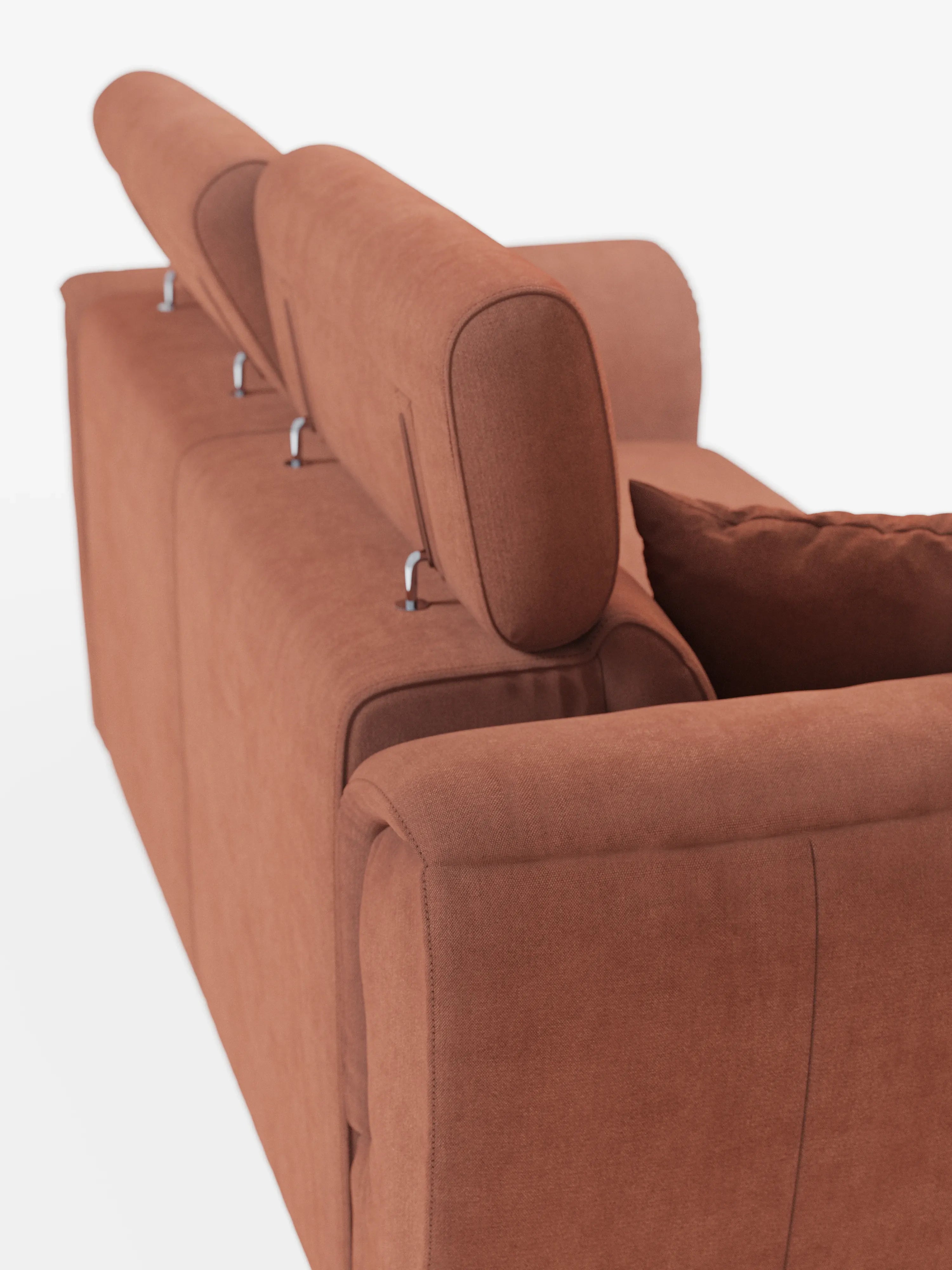 Il divano a 2 posti estraibile Titano con poggiatesta reclinabili in tessuto smacchiabile Oeko-Tex® di Divani.Store è qui presentato in una moderna finitura color ruggine, con poggiatesta regolabili e un cuscino coordinato. Ripreso in una vista posteriore obliqua su uno sfondo bianco a tinta unita, il suo rivestimento morbido e soffice rende questo divano compatto e contemporaneo un complemento d’arredo ideale per qualsiasi soggiorno moderno.