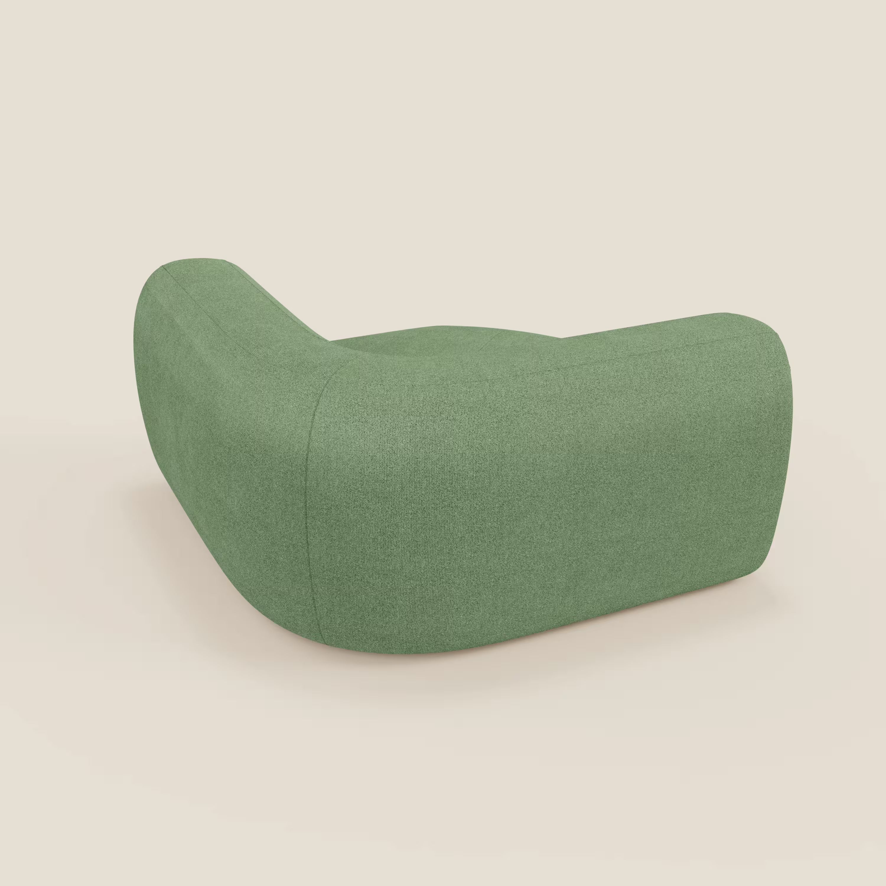 Bonbon Modulo angolare di Divani.Store è una moderna poltrona modulare a basso profilo in tessuto antimacchia verde menta T23, caratterizzata da bordi arrotondati e da un design senza soluzione di continuità, vista da dietro su uno sfondo beige chiaro.