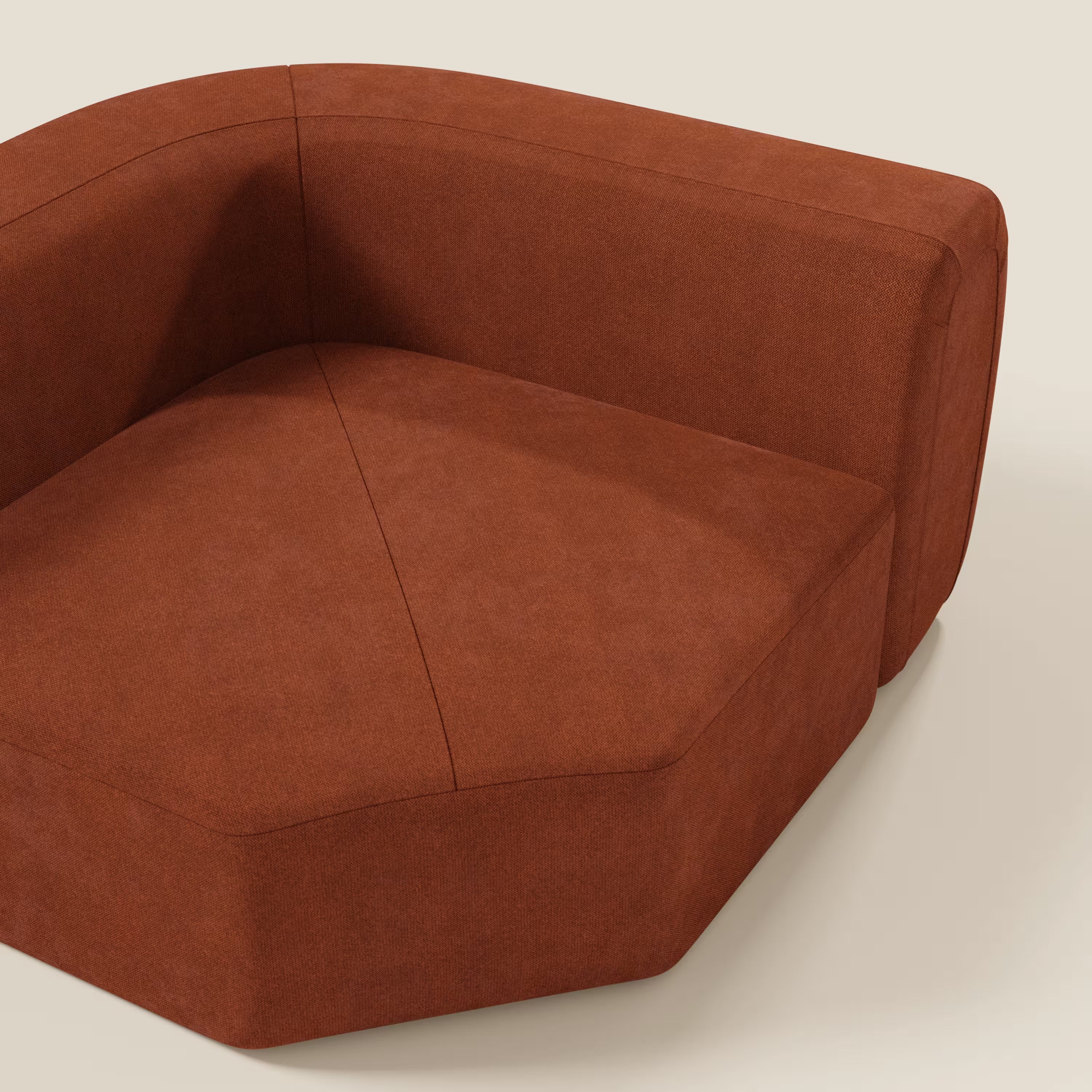 Primo piano di Bonbon Modulo angolare di Divani.Store, un moderno modulo angolare in tessuto antimacchia T23 color ruggine dalle linee pulite e dalle sottili cuciture, che mette in mostra il suo design contemporaneo.