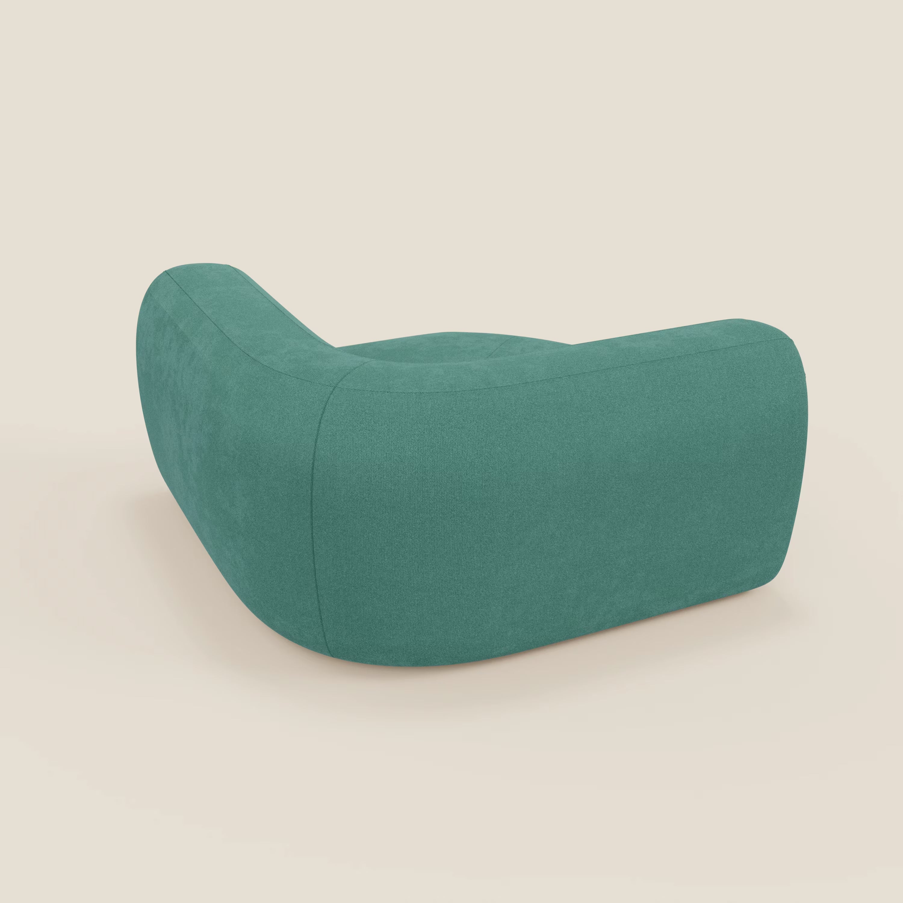 Bonbon Modulo angolare di Divani.Store è una poltrona moderna e di basso profilo in tessuto antimacchia T23 verde acqua, caratterizzata da curve morbide e da una superficie soffice, su uno sfondo beige chiaro.