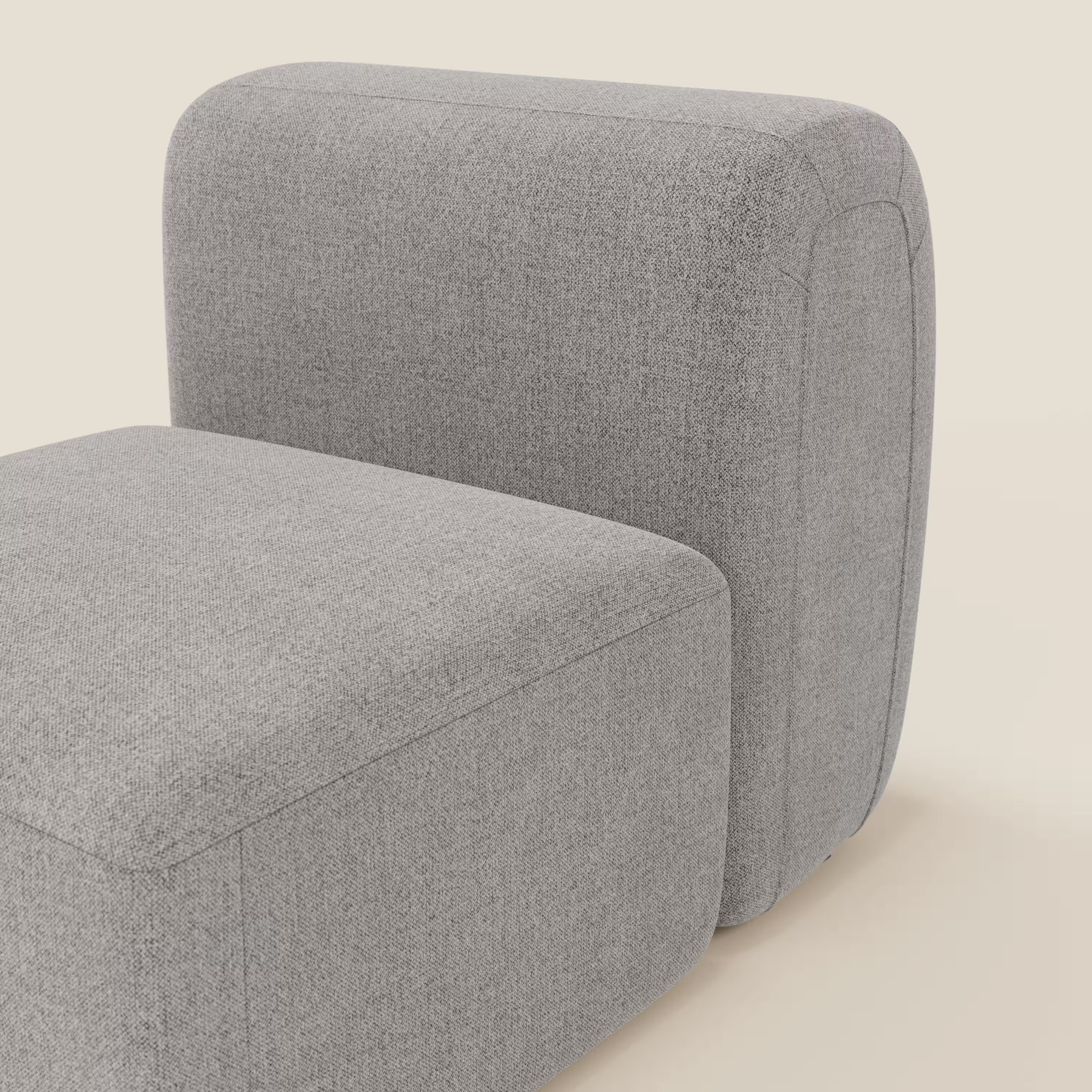 BonBon modulo centrale 70 cm di Divani.Store è una moderna sedia senza braccioli o componibile con spessi cuscini rettangolari in tessuto antimacchia T23 grigio e un design minimalista e a blocchi su sfondo beige.