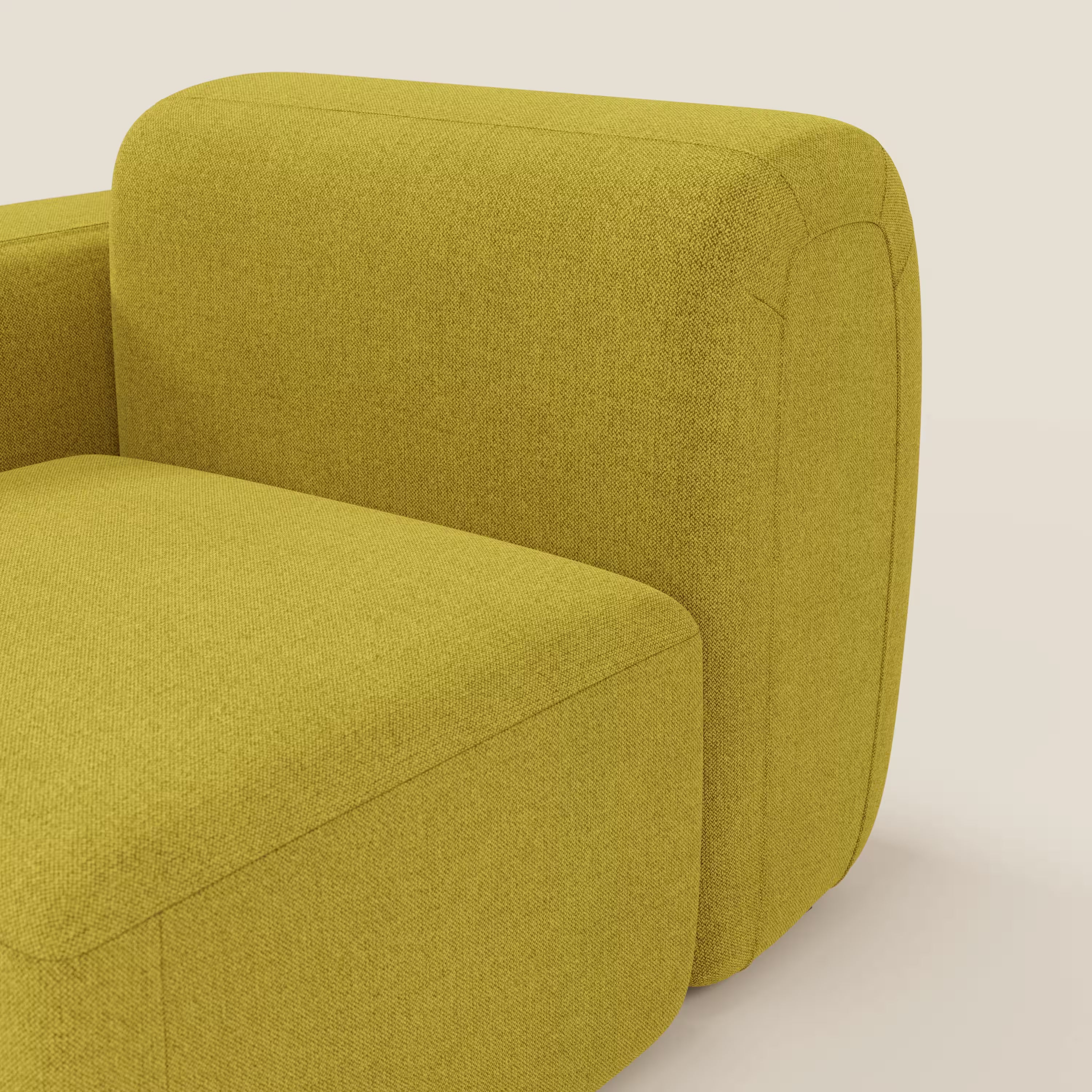 Primo piano di BonBon modulo terminale 105 cm di Divani.Store, rivestito in tessuto T23 giallo sole, facile da pulire. Il design arrotondato e il bracciolo morbido conferiscono un tocco minimalista e contemporaneo su uno sfondo neutro.