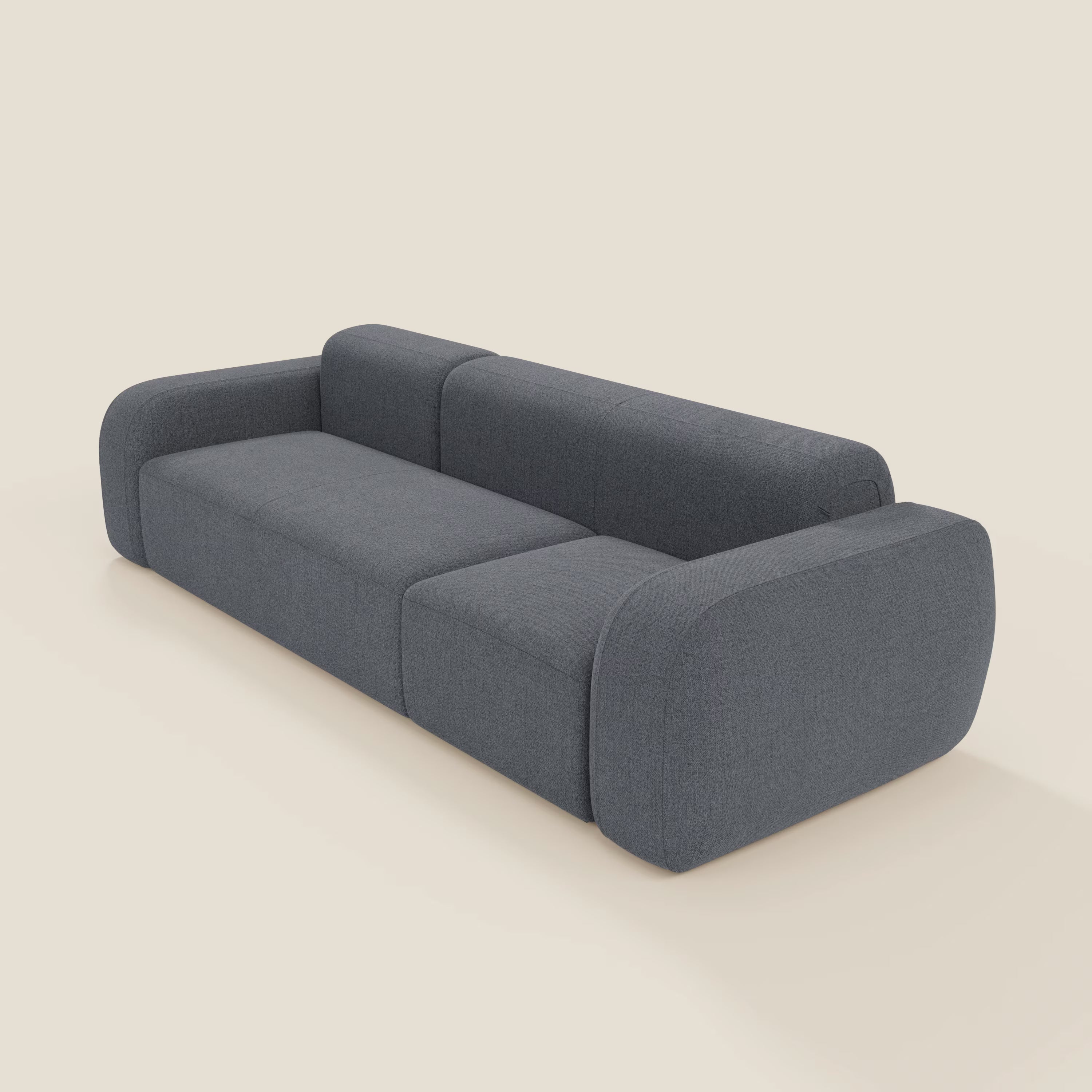 Il BonBon Divano componibile - Composizione Spaccamattone di Divani.Store è un divano componibile a tre posti con braccioli e schienale arrotondati, rivestito in tessuto antimacchia T23 blu grafite, dal design minimalista e dalle linee pulite.