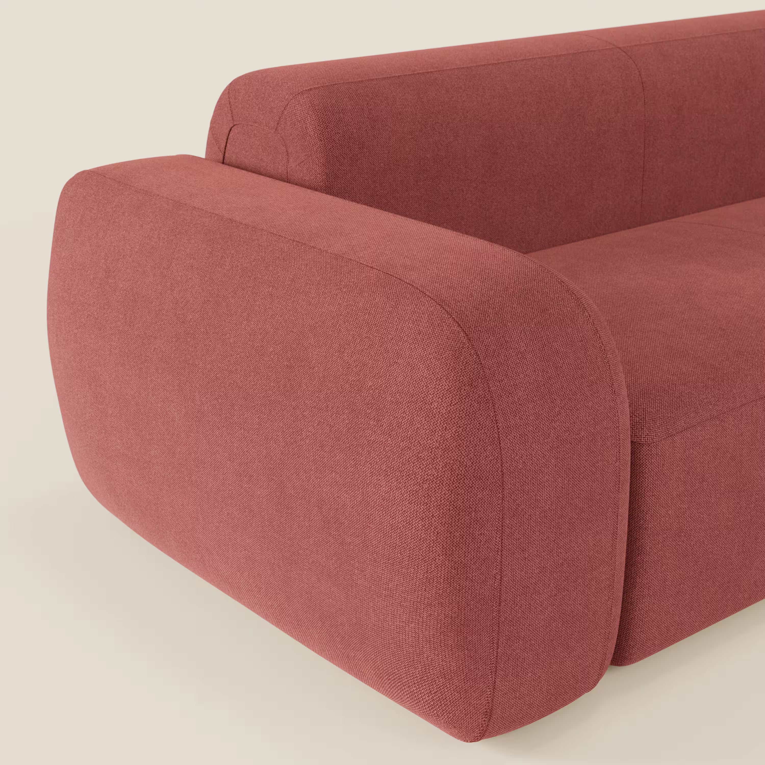 Il divano BonBon angolare componibile e modulare di Divani.Store è caratterizzato da tessuto smacchiabile T23 rosso ciliegia, morbidi bordi arrotondati, spessi braccioli imbottiti, curve morbide e un design minimalista con un'eleganza Made in Italy senza tempo.