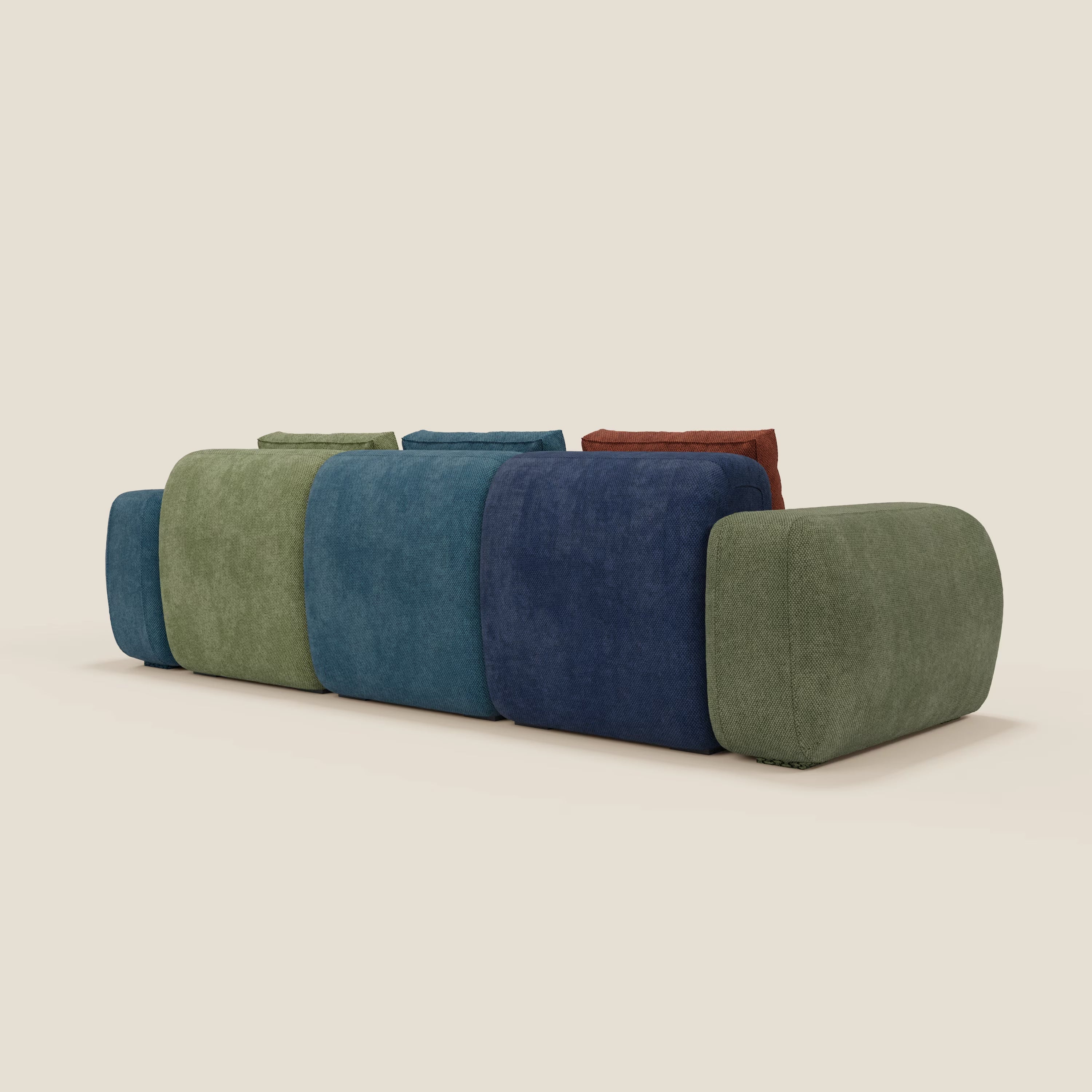 Il divano componibile 3 sedute BonBon - edizione Grande Fratello di Divani.Store è un divano componibile moderno e minimalista con cuscini in peluche verdi, blu, navy, oliva e rosso scuro su una base imbottita beige chiaro.