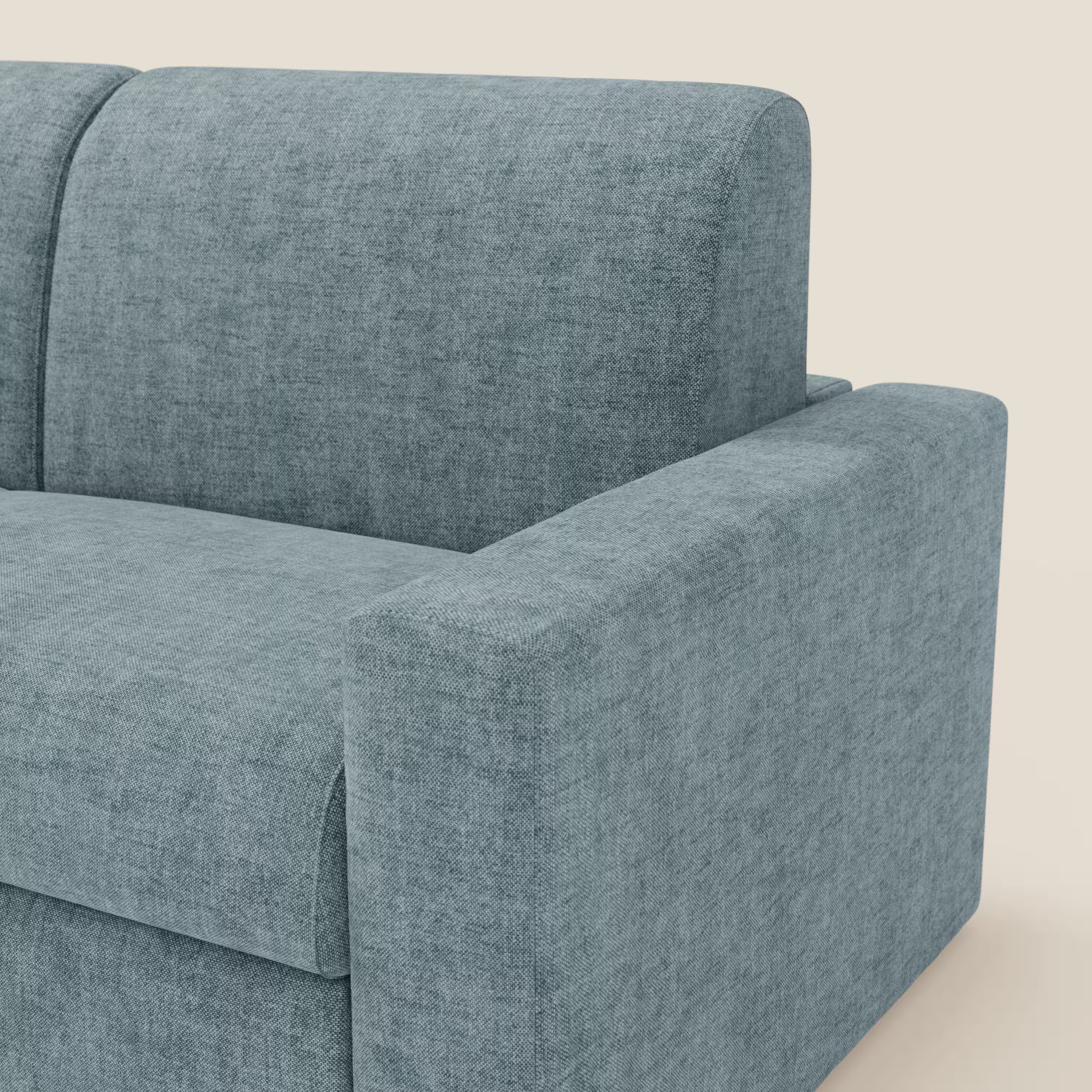 Primo piano del divano letto matrimoniale Diomede di Divani.Store in velluto carta da zucchero. L'immagine evidenzia il bracciolo, la seduta e lo schienale, mostrando il morbido tessuto T35 easy-clean e il design moderno su uno sfondo semplice.