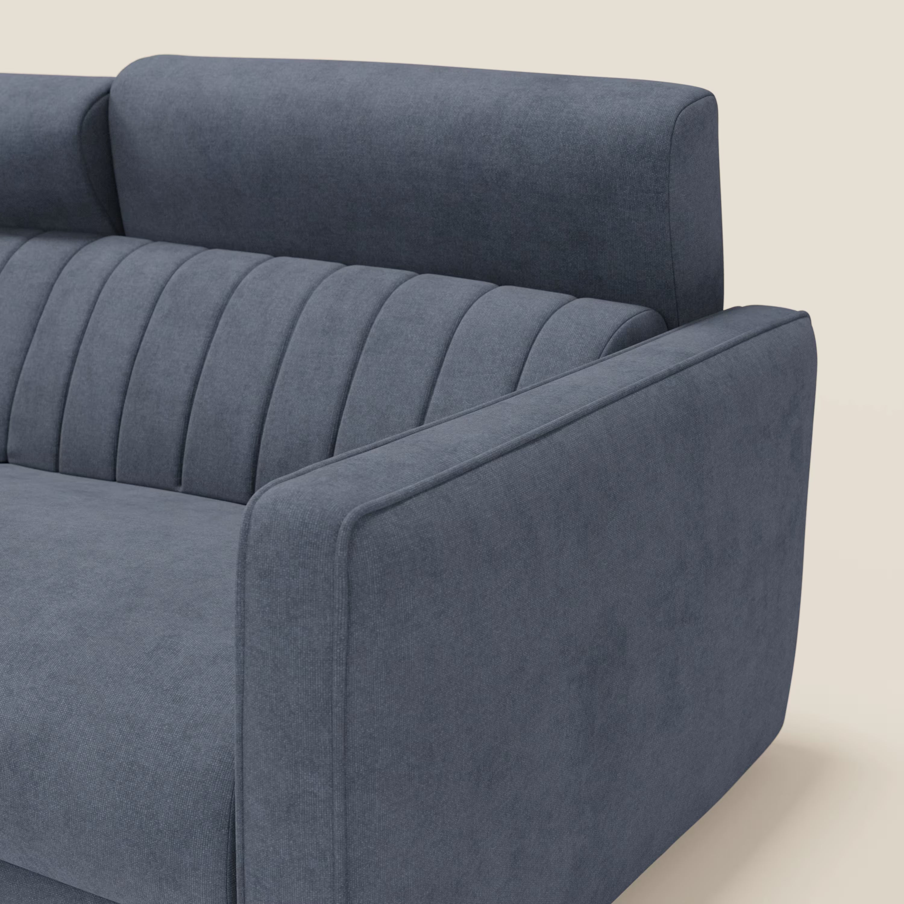Primo piano di Nivon Divano letto moderno di Divani.Store in tessuto impermeabile T25 blu denim, con un bracciolo, uno schienale trapuntato a cuciture verticali e linee morbide per un look contemporaneo e confortevole.