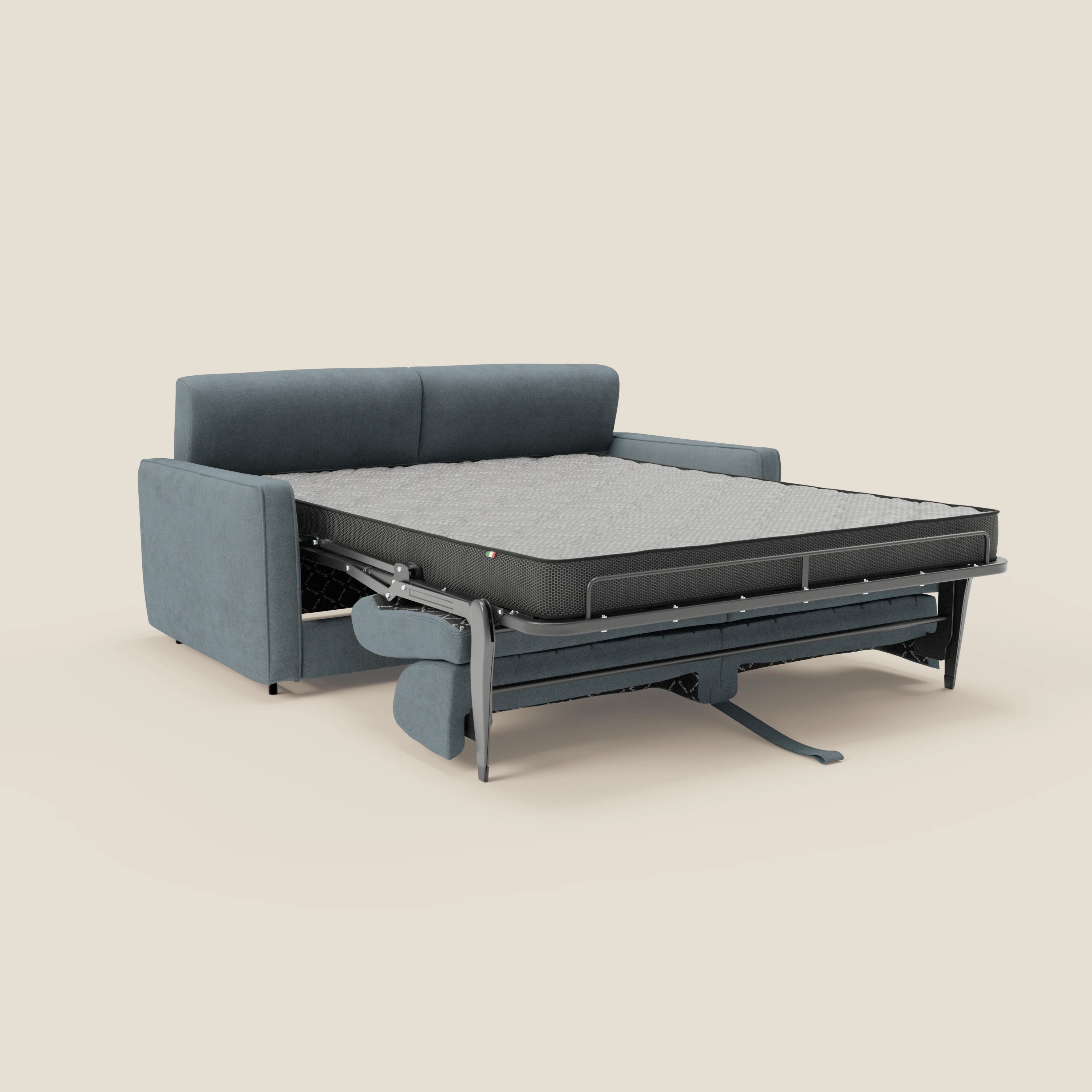 Il Nivon Divano letto moderno di Divani.Store, presentato in tessuto impermeabile carta da zucchero con materasso H16 cm e poggiatesta regolabile, mostra la sua struttura metallica pieghevole su uno sfondo beige, sottolineando stile e pratico comfort.