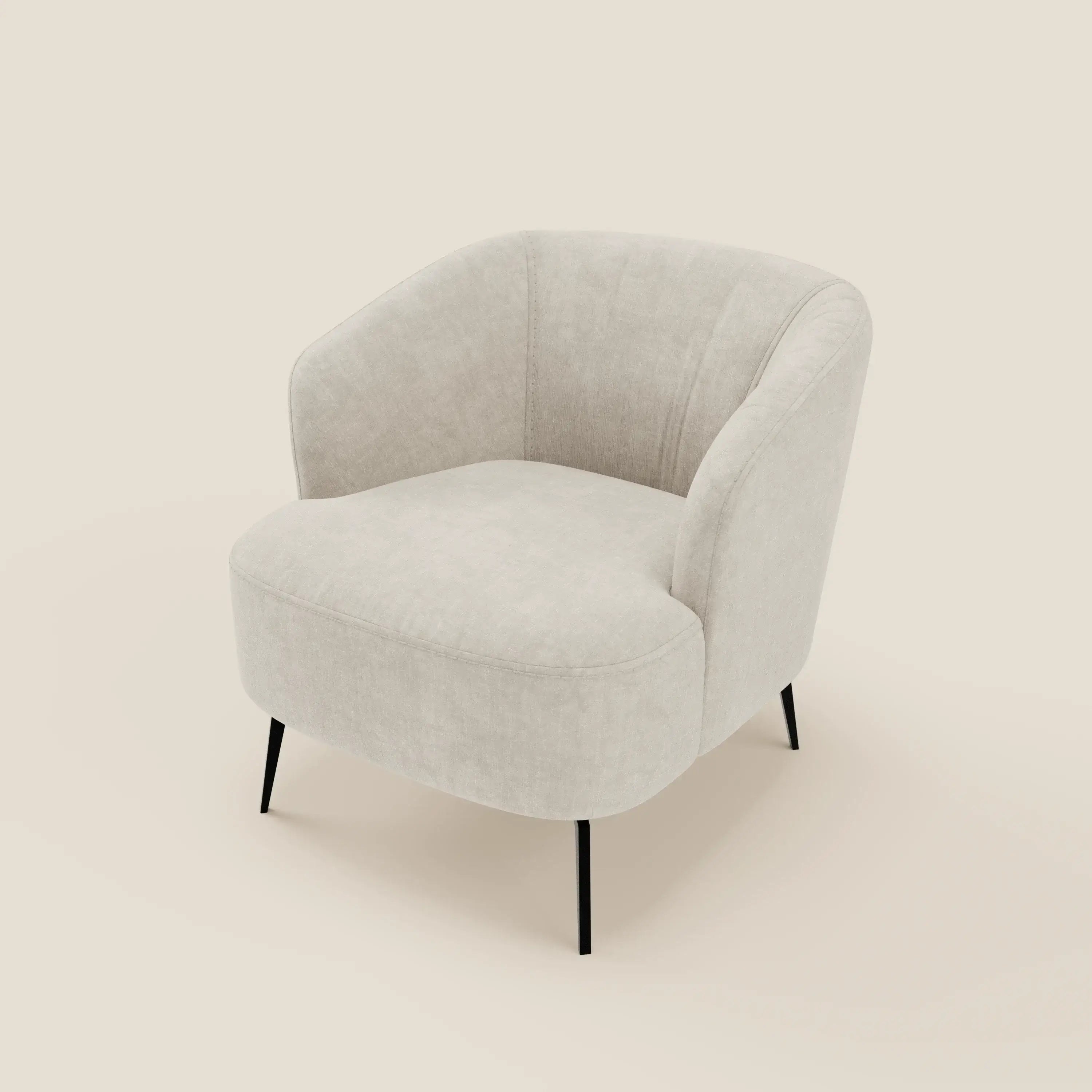 La poltroncina Renoa di Divani.Store è caratterizzata da un tessuto smacchiabile T24 bianco latte, da uno schienale e braccioli dolcemente curvati e da sottili gambe in metallo nero, per offrire un comfort elegante in qualsiasi spazio moderno.