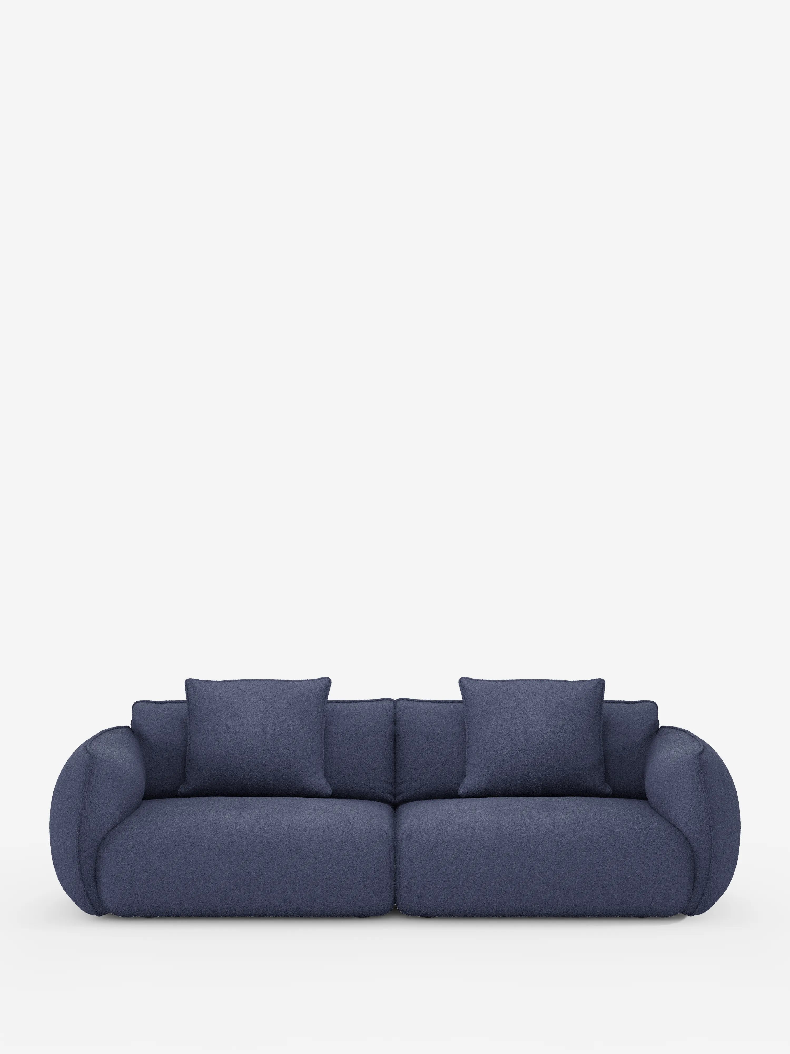Il divano modulare e componibile Nimbus a 3 posti di Divani.Store è un moderno divano in tessuto blu intenso con braccioli e schienale arrotondati, dotato di due cuscini di seduta e tre cuscini quadrati coordinati per lo schienale. Su uno sfondo bianco a tinta unita, questo divano modulare e facilmente configurabile da 250 cm — con rivestimento T33 effetto cotone, sfoderabile e resistente alle macchie — offre opzioni di configurazione versatili per adattarsi a qualsiasi ambiente.