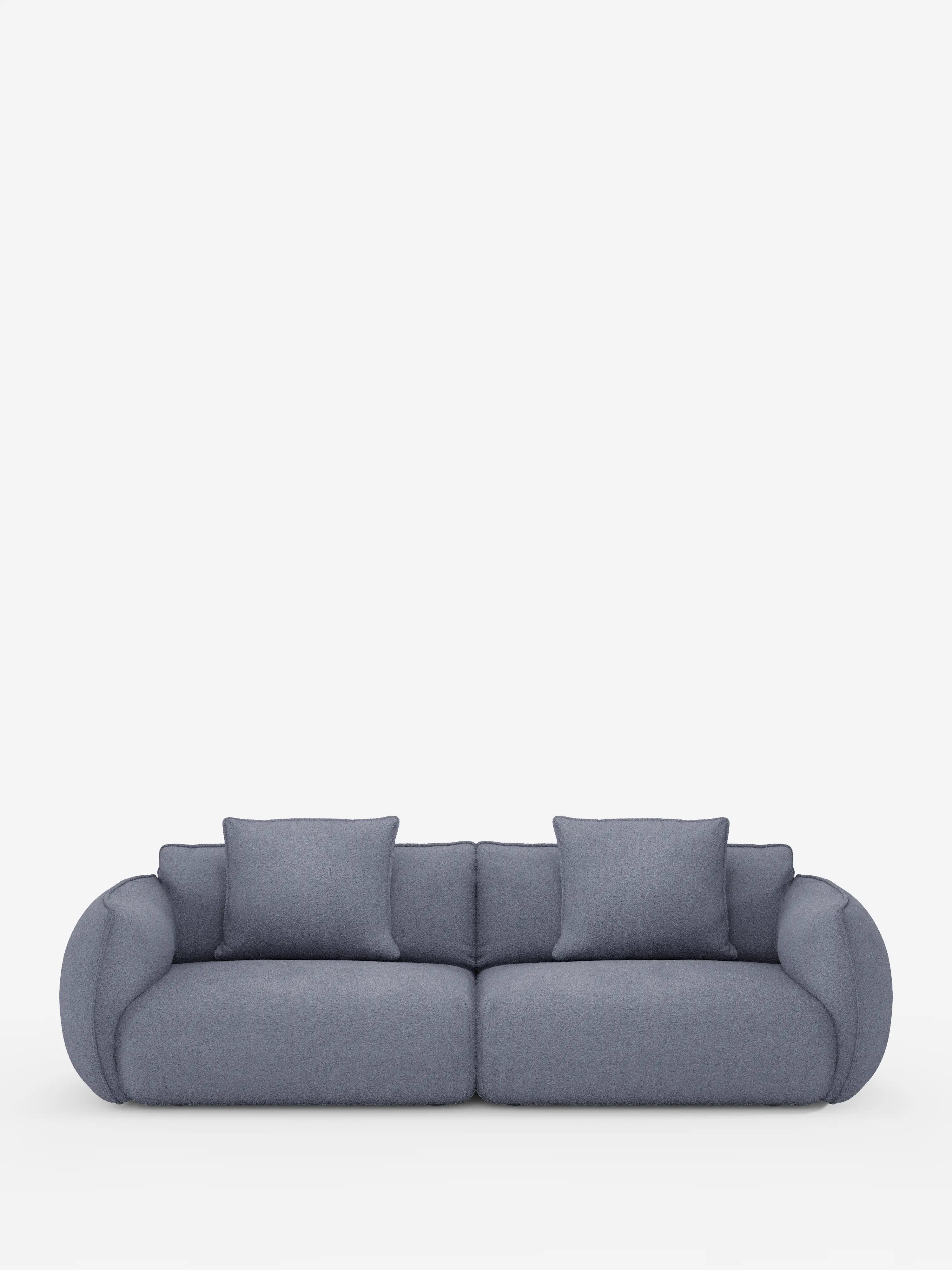 Un moderno divano modulare e componibile Nimbus a 3 posti, color grigio chiaro, da 250 cm di Divani.Store, si staglia su uno sfondo bianco a tinta unita. Rivestito con un tessuto sfoderabile effetto cotone resistente alle macchie (t33), questo divano minimalista presenta due cuscini di seduta, due cuscini dello schienale e braccioli arrotondati che gli conferiscono un aspetto morbido e confortevole.