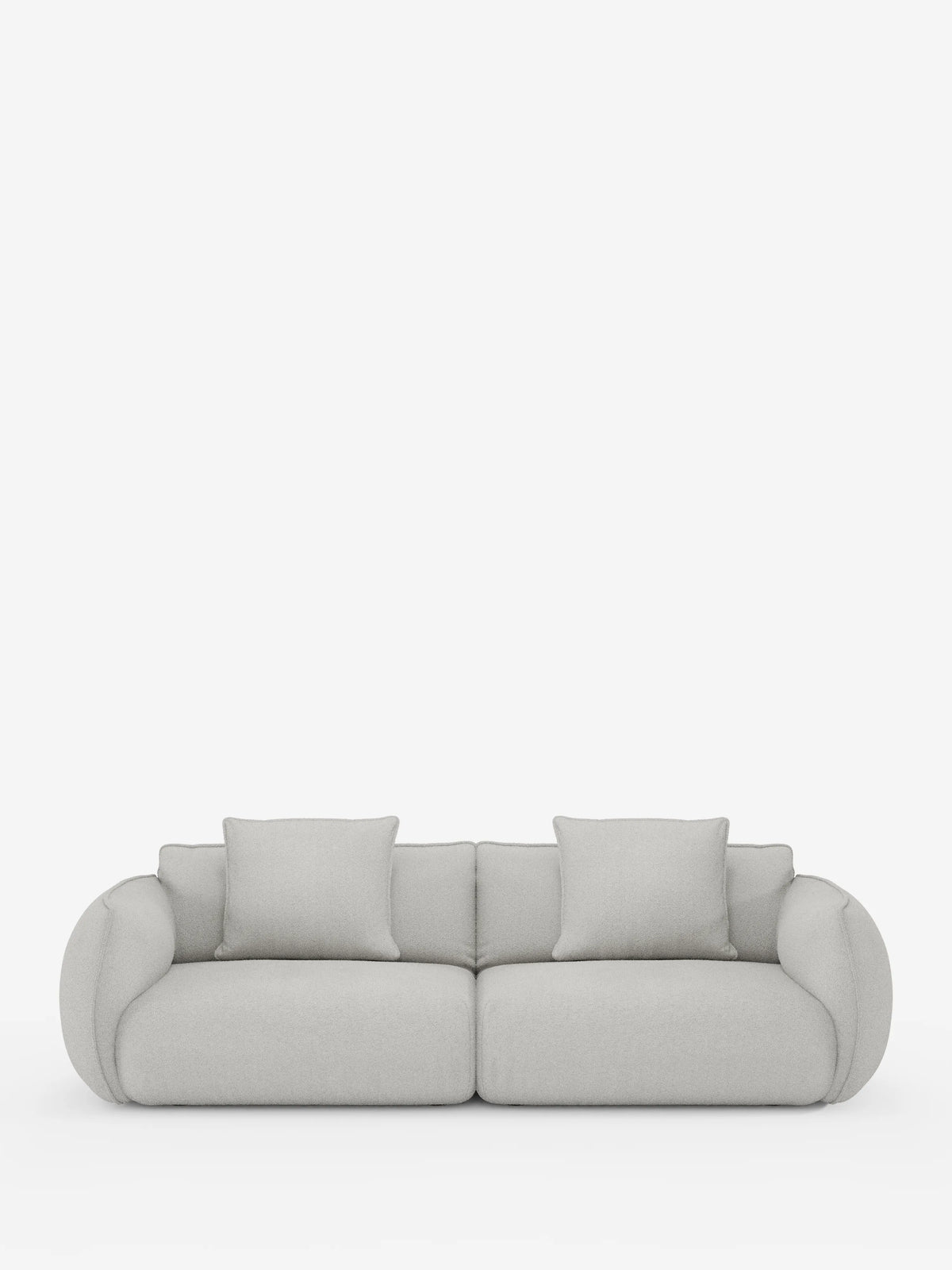 Il divano Nimbus, un modello contemporaneo a 3 posti, modulare e componibile da 250 cm di Divani.Store, è presentato su uno sfondo bianco a tinta unita. Rivestito in tessuto grigio chiaro effetto cotone antimacchia (t33), questo divano presenta braccioli e schienale lisci e arrotondati, due generosi cuscini di seduta e due cuscini quadrati abbinati per lo schienale. Il suo design minimalista esalta sia lo stile che il comfort, con fodere completamente sfoderabili per una facile manutenzione.