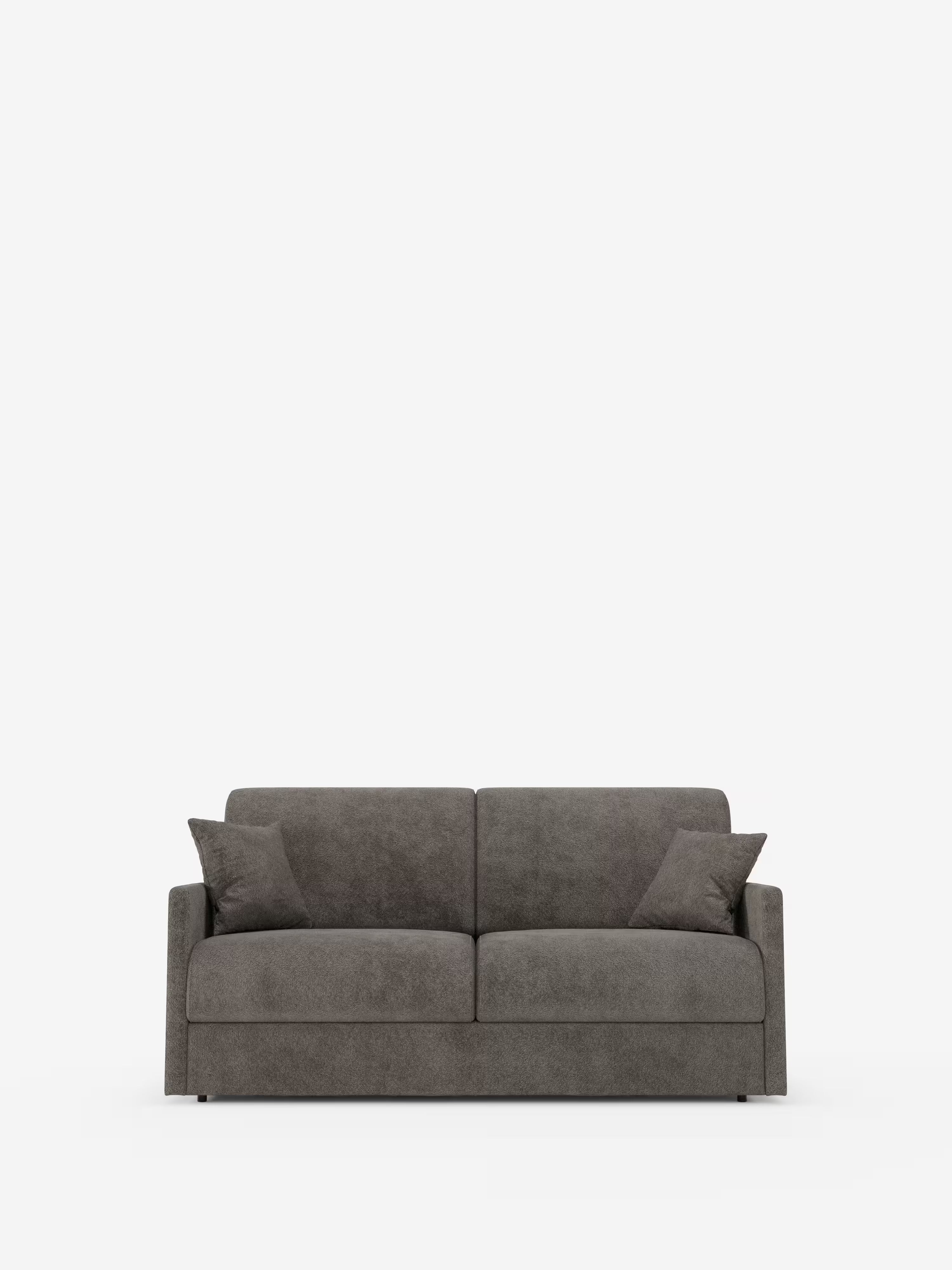 Un divano a due posti contemporaneo, di colore grigio scuro, di Divani.Store, il Tommy Divano letto a 2 e 3 posti matrimoniale, spicca su uno sfondo bianco a tinta unita. Questo divano dal design minimalista presenta braccioli sottili, due cuscini decorativi abbinati e un rivestimento in tessuto simile alla pelle scamosciata, smacchiabile, in simil cotone T33, completamente sfoderabile per una facile pulizia. Il design è privo di gambe a vista o decorazioni, per un look moderno.