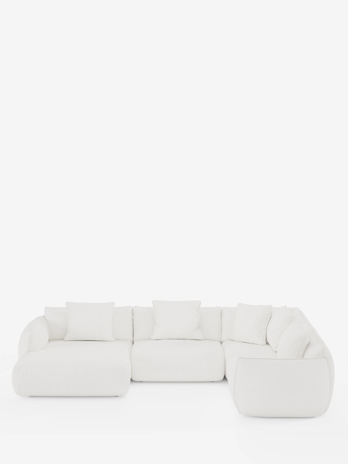 Un divano angolare panoramico componibile Nimbus in stile contemporaneo, bianco, con penisola e angolo in tessuto smacchiabile T33 di Divani.Store, caratterizzato da bordi arrotondati e morbidi cuscini disposti a forma di L su uno sfondo bianco a tinta unita. Questo elegante divano componibile vanta cinque cuscini dello schienale e linee morbide e minimaliste, che creano un’atmosfera accogliente e invitante.