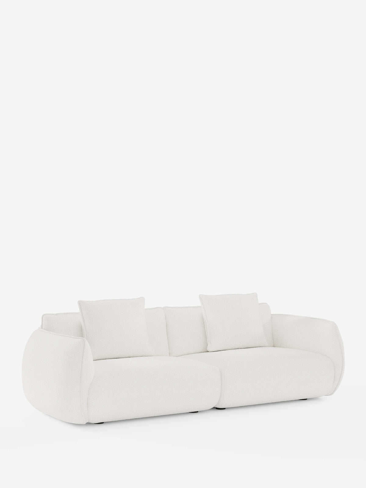 Il divano modulare a 3 posti Nimbus di Divani.Store presenta un design moderno in bianco, con bordi arrotondati e morbidi e una silhouette dal profilo basso. Con una lunghezza di 250 cm, questo divano comprende due cuscini di seduta e quattro cuscini schienali quadrati abbinati, tutti rivestiti in tessuto sfoderabile con effetto cotone testurizzato e resistente alle macchie (t33). Presentato su uno sfondo bianco a tinta unita, ne viene esaltata l’estetica minimalista e contemporanea.