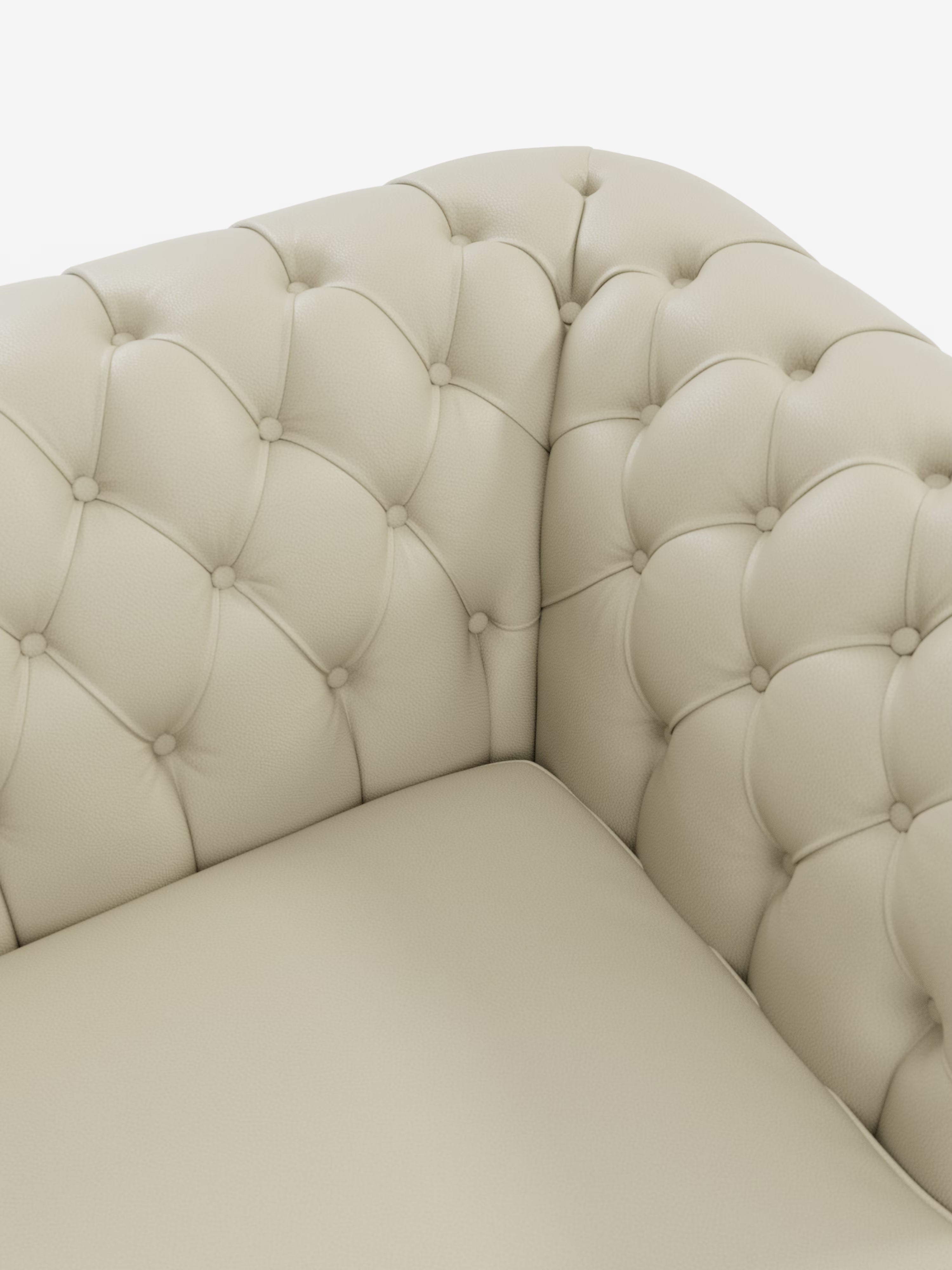 Primo piano di un Chester – Divano Chesterfield in vera pelle spessorata a 2 e 3 posti di Divani.Store, che mette in risalto l'angolo in pelle beige trapuntata con i classici bottoni decorativi e i morbidi cuscini imbottiti; questo divano realizzato artigianalmente in Italia emana un'eleganza senza tempo su uno sfondo bianco a tinta unita.