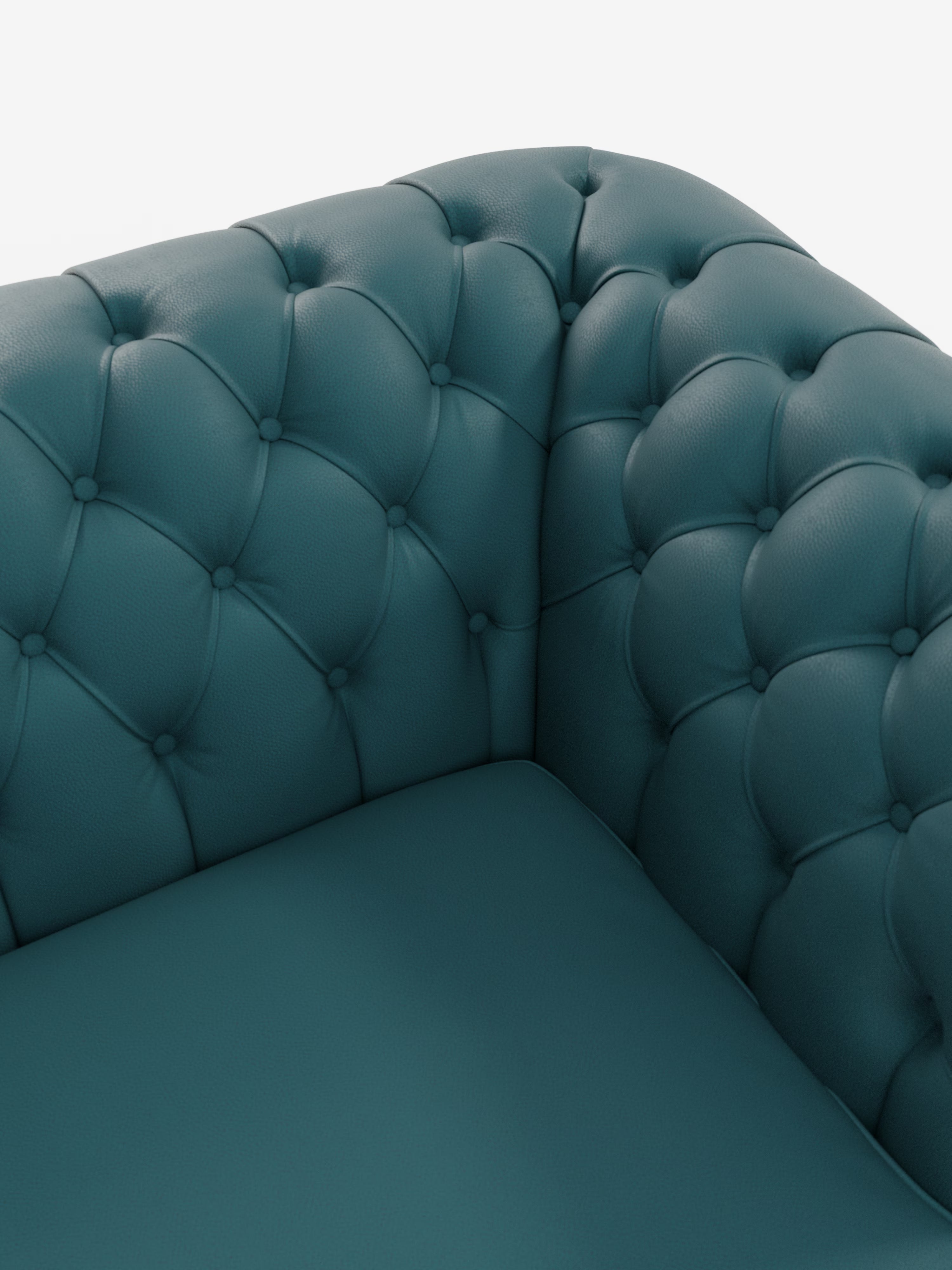 Primo piano di un divano ad angolo in pelle verde acqua, trapuntato e con bottoni decorativi. Il rivestimento, realizzato in vera pelle spessorata, appare liscio e imbottito, mettendo in risalto il classico design in stile Chesterfield del modello “Chester – Divano Chesterfield in vera pelle spessorata a 2 e 3 posti” di Divani.Store su uno sfondo bianco a tinta unita.