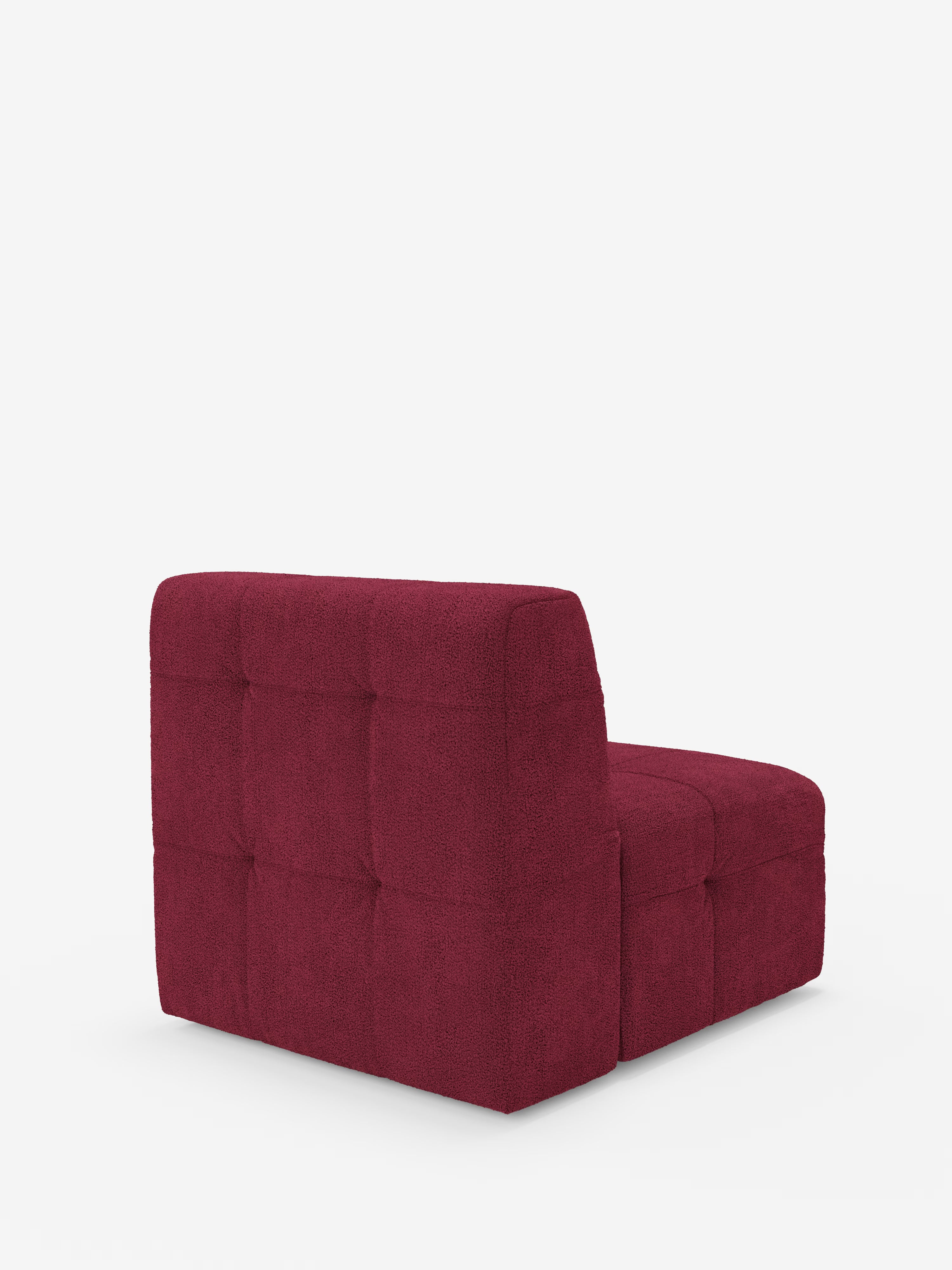 Scoprite la raffinatezza contemporanea con la poltrona Mosaic modulo da 77 cm di Divani.Store, un'elegante poltrona senza braccioli caratterizzata da un rivestimento in bouclé rosso intenso e testurizzato, realizzato in tessuto T21 facile da pulire, e da raffinate sezioni capitonné quadrate su seduta e schienale, che risaltano magnificamente sullo sfondo bianco a tinta unita.