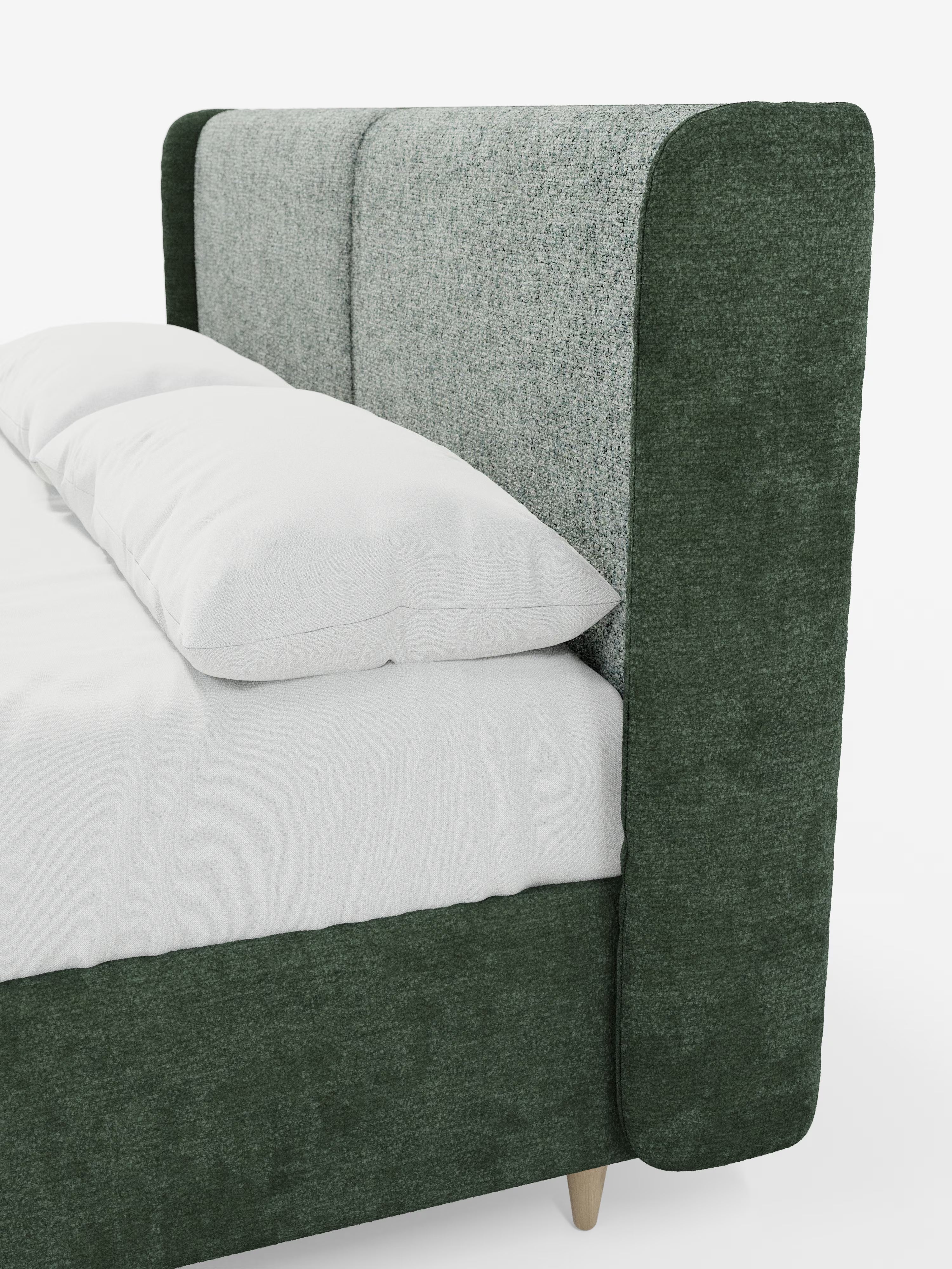 Primo piano del letto imbottito bicolore VALKIRIA con contenitore di Letti.store, caratterizzato da cuscini schienali e da una testiera curva avvolgente in tessuto con texture nei toni del grigio chiaro e del verde scuro. Il letto è abbinato a un cuscino bianco, biancheria da letto bianca e gambe in legno chiaro. L’estetica complessiva è minimalista e contemporanea, con linee pulite e materiali morbidi.