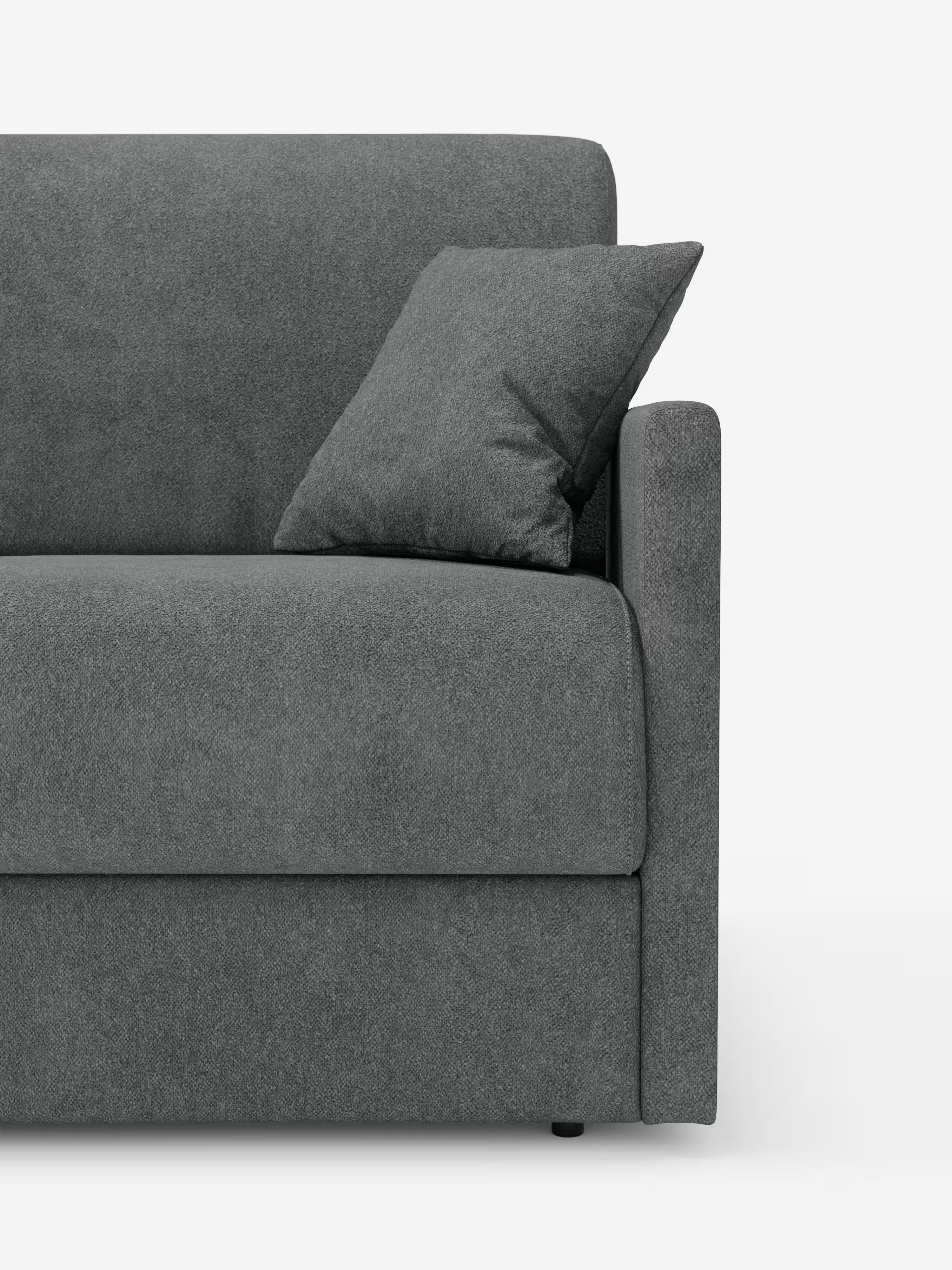 Un primo piano del divano letto Tommy Divani Store a 2 e 3 posti matrimoniale, rivestito in tessuto T33 grigio simile al cotone e resistente alle macchie, con cuscino abbinato. È visibile solo il lato destro di questo moderno divano con rivestimento sfoderabile al 100%, che mostra un bracciolo e parte della seduta e dello schienale su uno sfondo bianco a tinta unita.