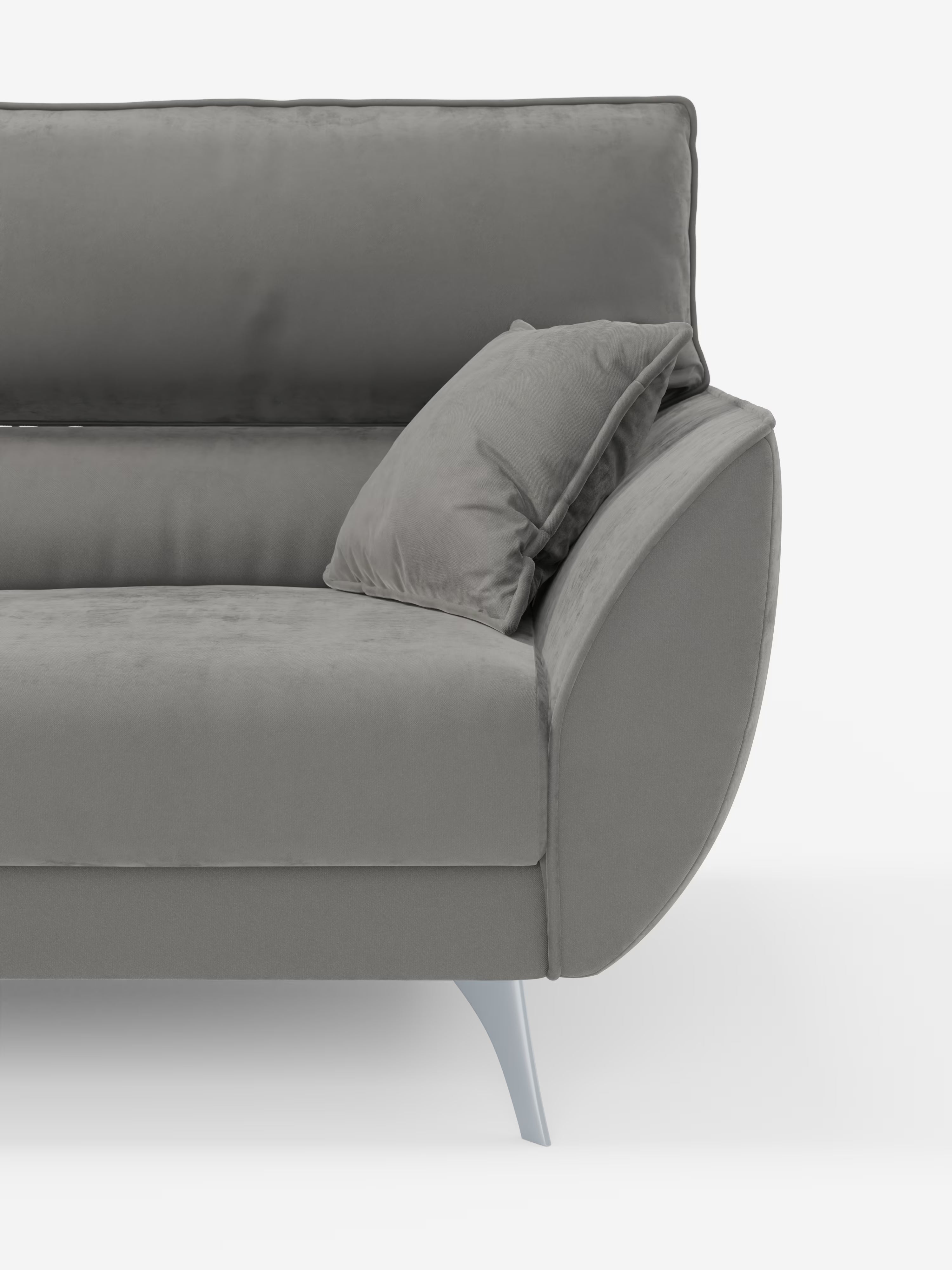 Nella foto è raffigurata metà di un moderno divano grigio Michelangelo 4 Posti di Divani.Store, con un cuscino decorativo abbinato; questo divano moderno presenta un rivestimento in vellutino liscio e facile da pulire, braccioli arrotondati ed eleganti gambe angolate in metallo. Uno sfondo bianco a tinta unita mette in risalto il design minimalista e contemporaneo del divano, con i suoi tre sedili estensibili e i poggiatesta regolabili.