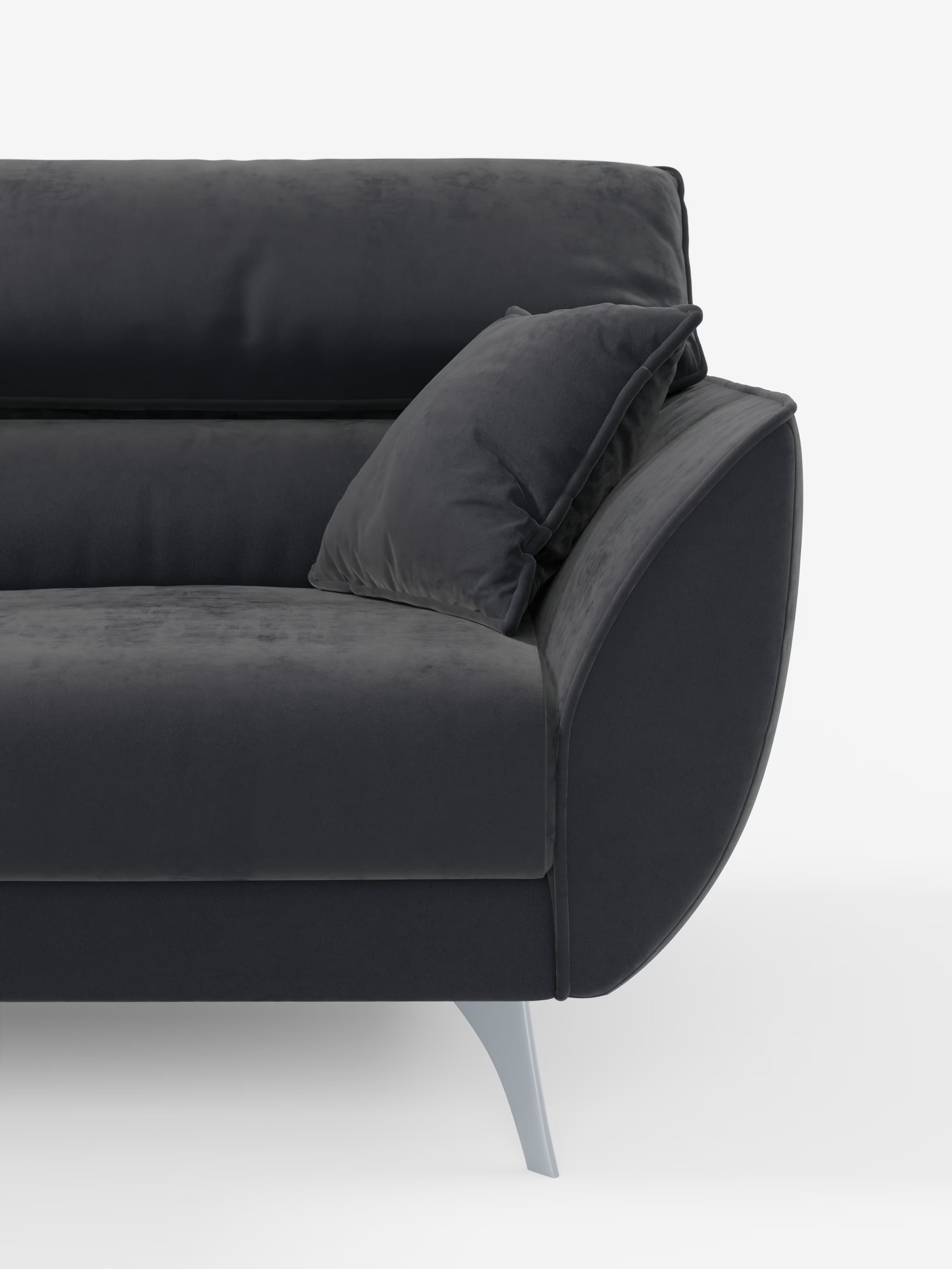 Un primo piano del lato destro del divano Michelangelo a 2 e 3 posti con sedute allungabili e poggiatesta reclinabili in tessuto smacchiabile T30 di Divani.Lo store ne mette in risalto il design moderno in grigio scuro, l'imbottitura morbida, i braccioli angolati, il cuscino decorativo abbinato e le eleganti gambe in metallo argentato — il tutto su uno sfondo bianco a tinta unita — catturando l'essenza del comfort contemporaneo e versatile sia nella versione a 2 che a 3 posti.