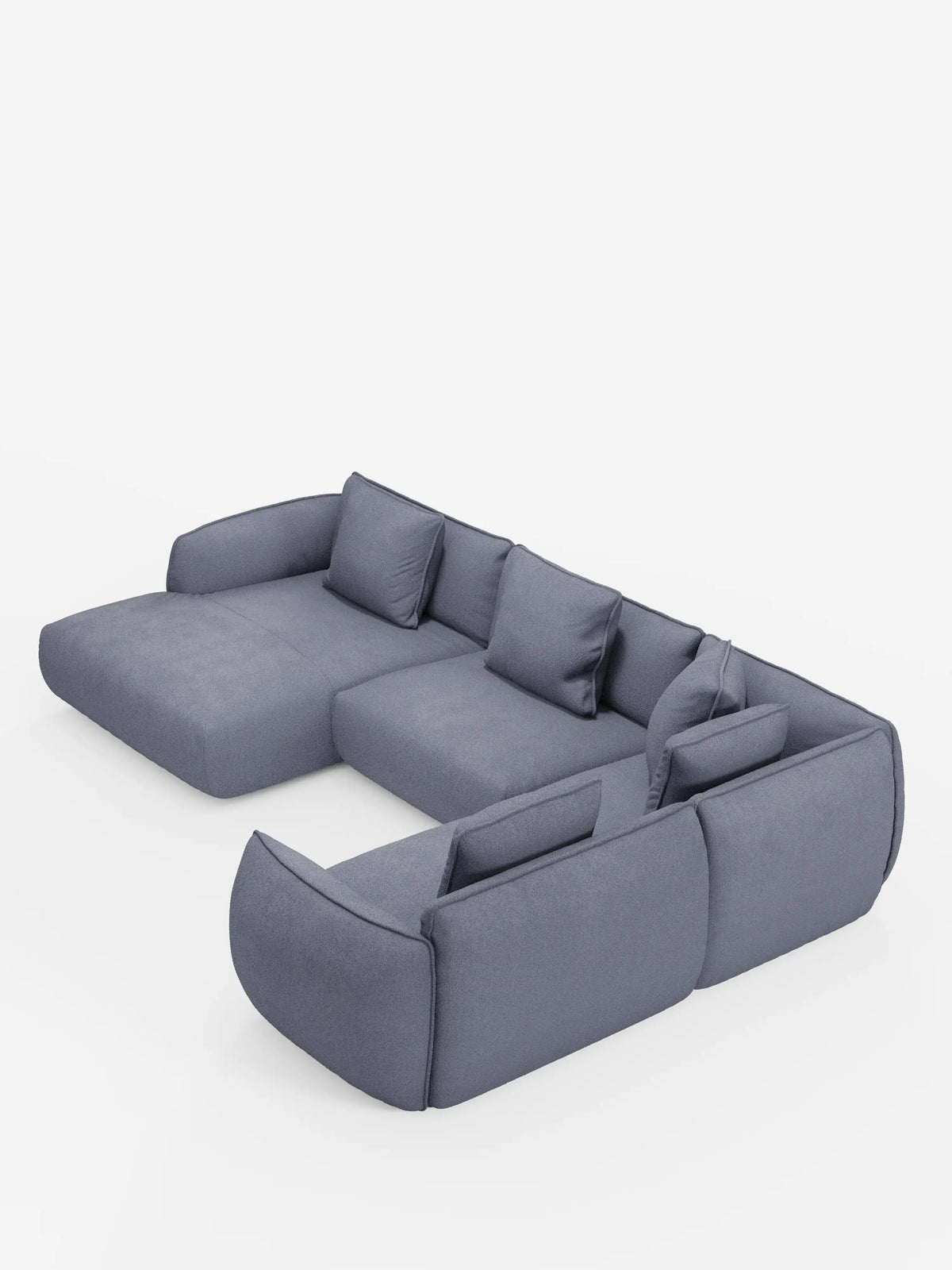 Il divano angolare panoramico componibile Nimbus con penisola e angolo in tessuto smacchiabile T33 di Divani.Store è un moderno divano modulare grigio con morbidi cuscini e ampi braccioli, disposto a forma di L su uno sfondo bianco a tinta unita. Caratterizzato da un design minimalista e corredato da cinque cuscini dello schienale sfoderabili, questo prodotto Made in Italy riflette un’elegante maestria artigianale.