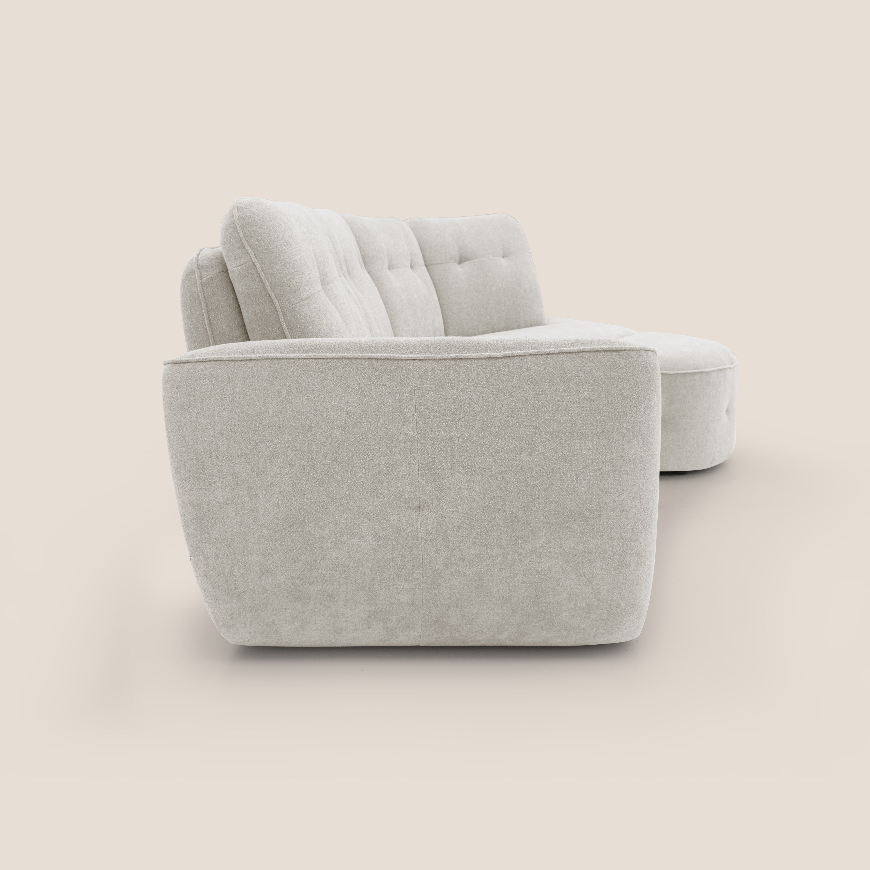 Cerbero divano angolare con pouf mobile in morbido bouclé impermeabile T07 bianco - divani.store
