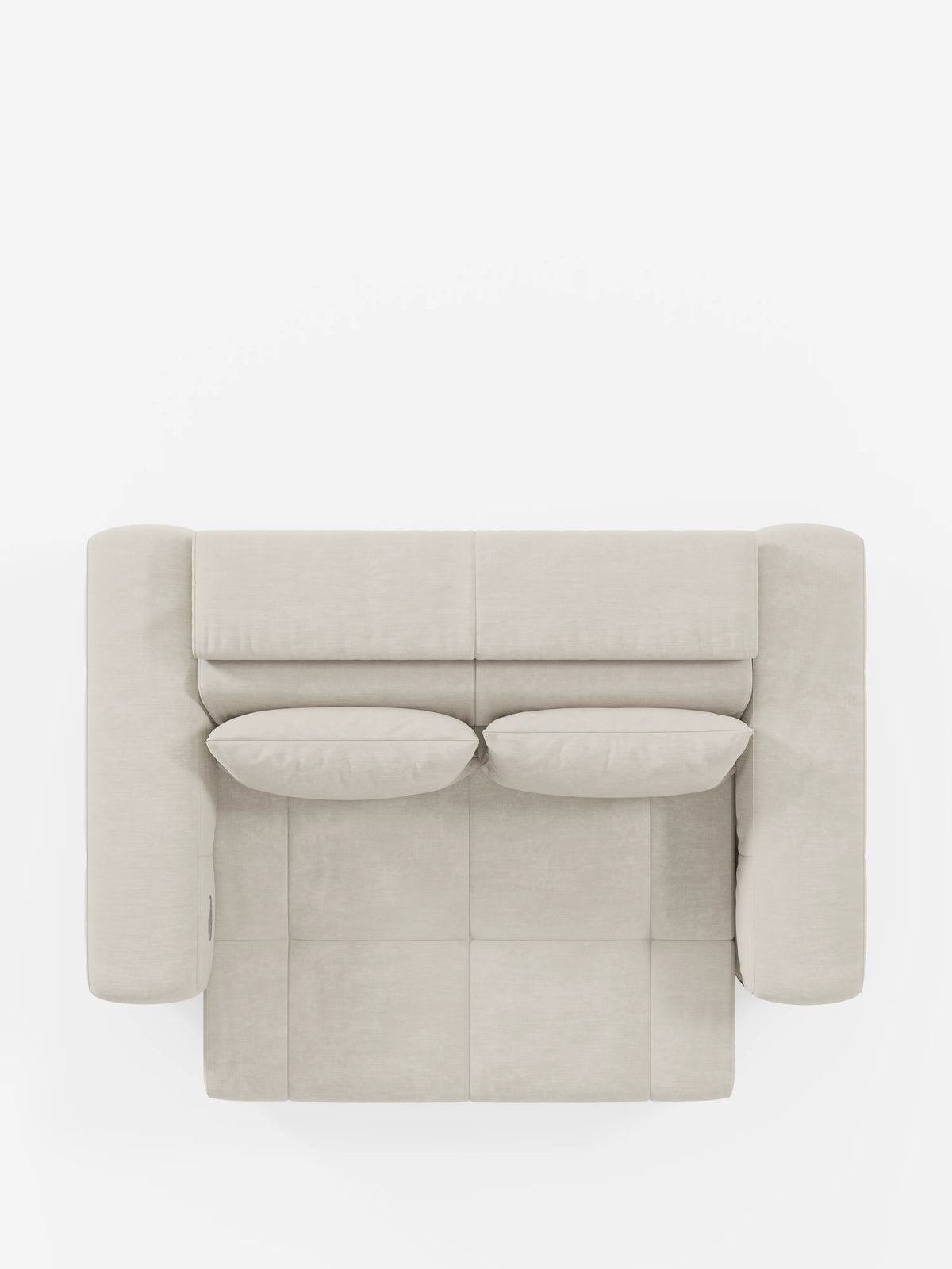 Vista dall'alto del divano Monarch con funzione relax elettrica per l'allungamento delle sedute e poggiatesta reclinabile, realizzato in morbido tessuto smacchiabile T31 di Divani.Store, qui raffigurato in beige chiaro. Questo divano dal design moderno e contemporaneo presenta braccioli squadrati e due cuscini coordinati. Su uno sfondo bianco, i cuscini della seduta e dello schienale presentano cuciture a vista che contribuiscono a creare un look pulito e simmetrico.